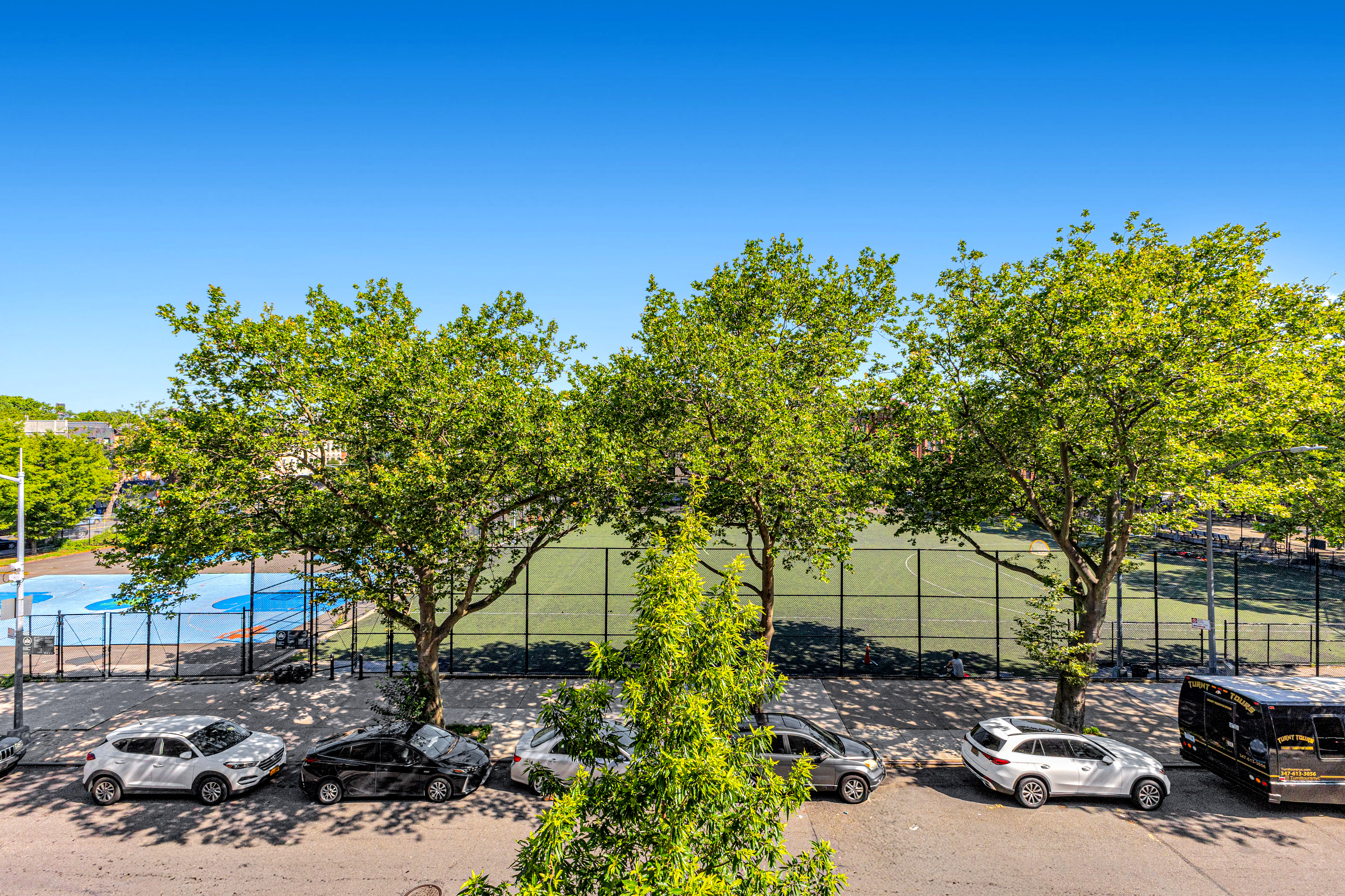 786 Madison Street, Unit 3B Brooklyn, NY 11221 - Photo 9 of 11 a view of a parking area