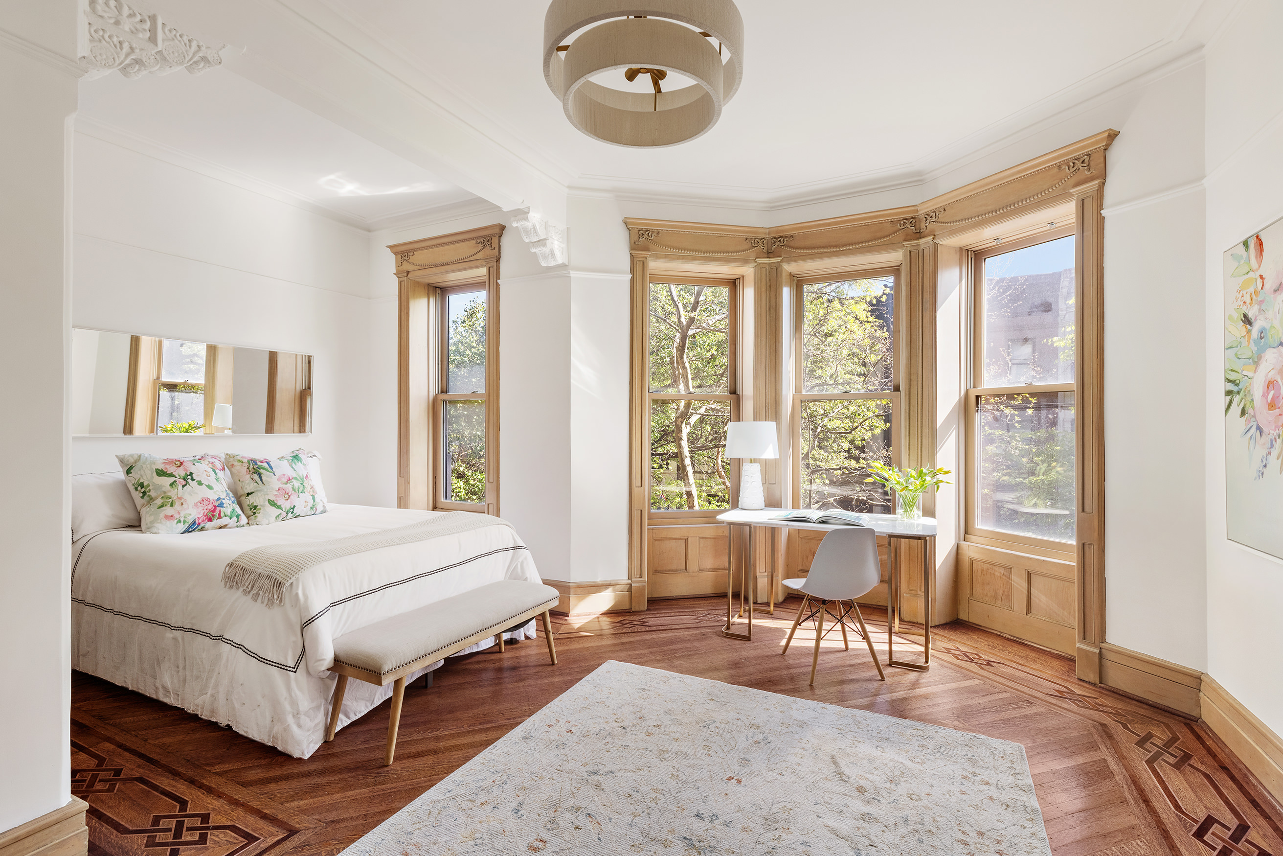 608 2nd Street Brooklyn, NY 11215 - Photo 21 of 34 a bedroom with a bed and a large window