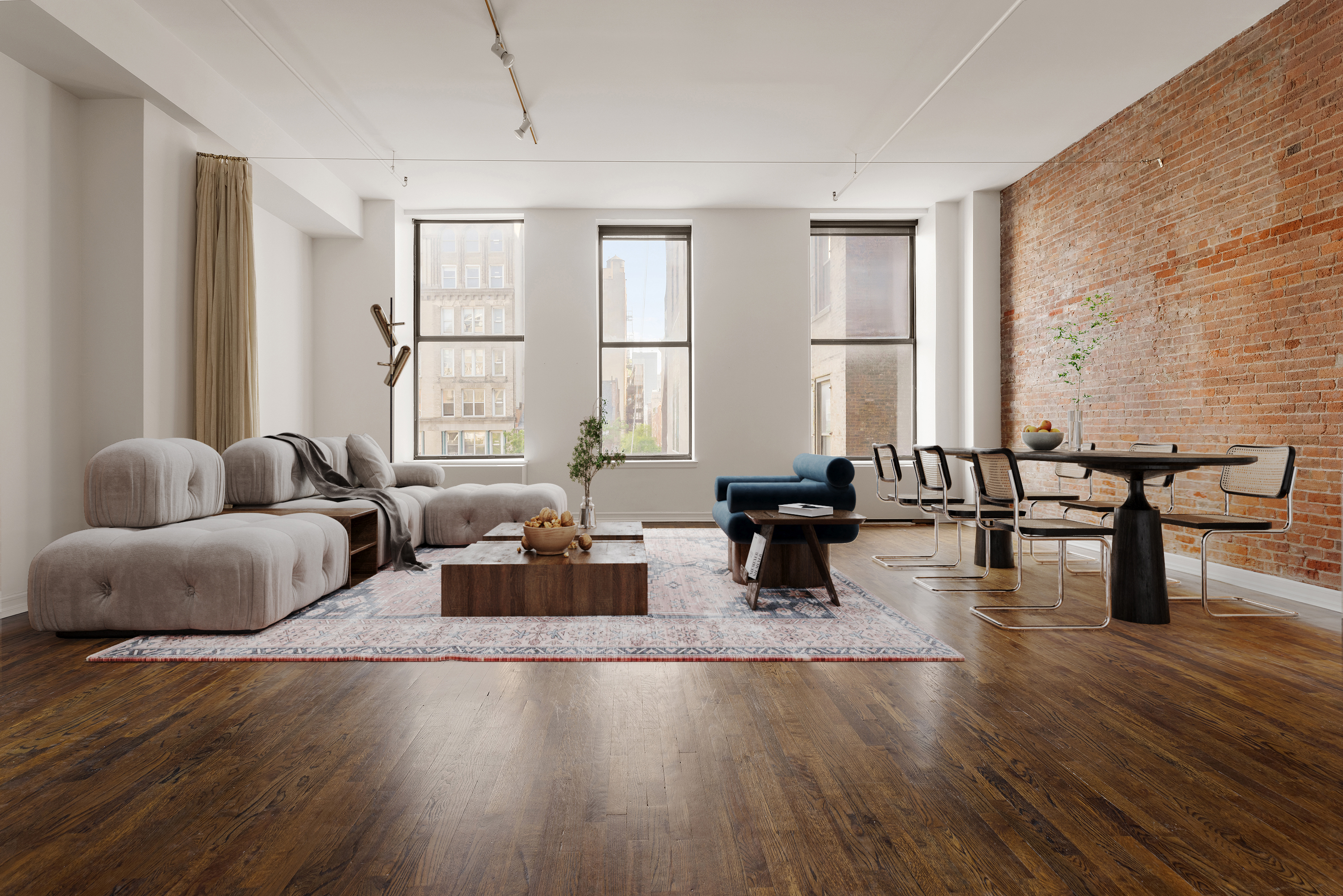 a living room with furniture and wooden floor