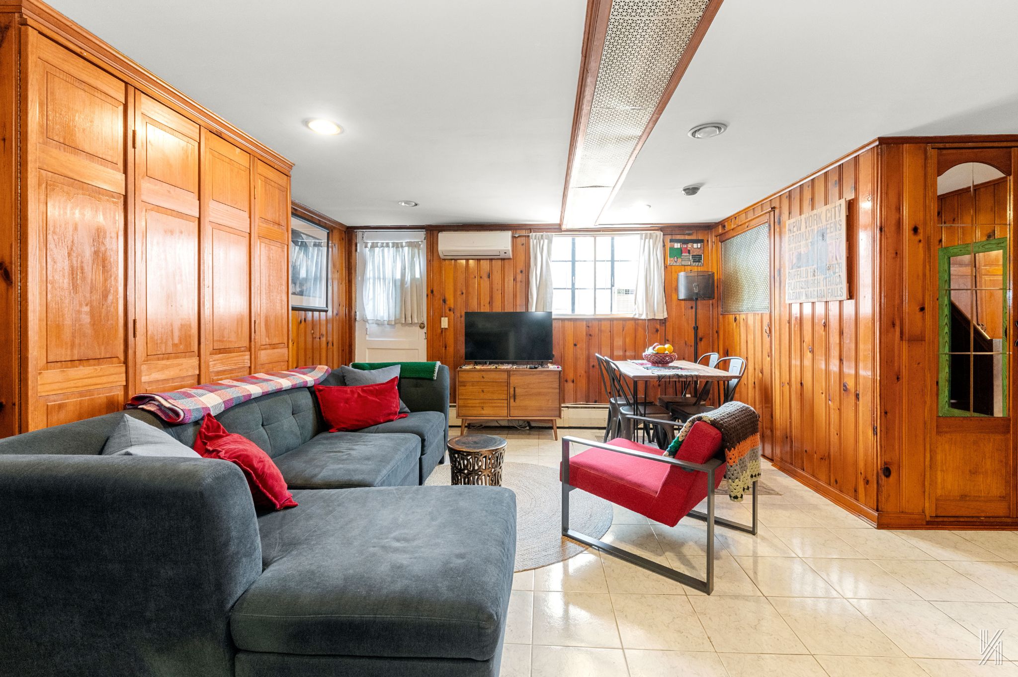 67-17 Eliot Avenue Queens, NY 11379 - Photo 16 of 21 a living room with furniture and a window