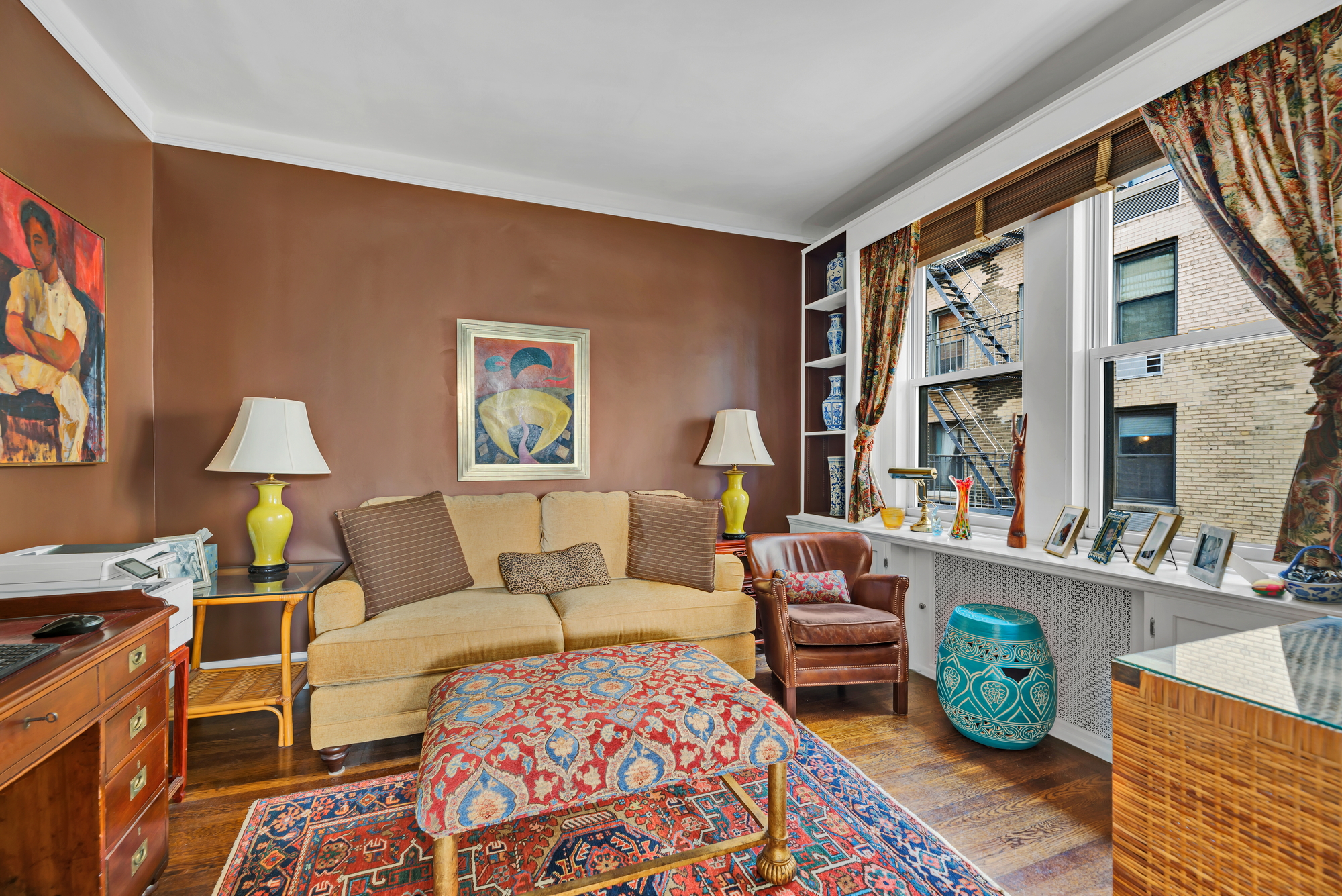455 East 51st Street, Unit 6B Manhattan, NY 10022 - Photo 7 of 17 a living room with furniture lamp and rug