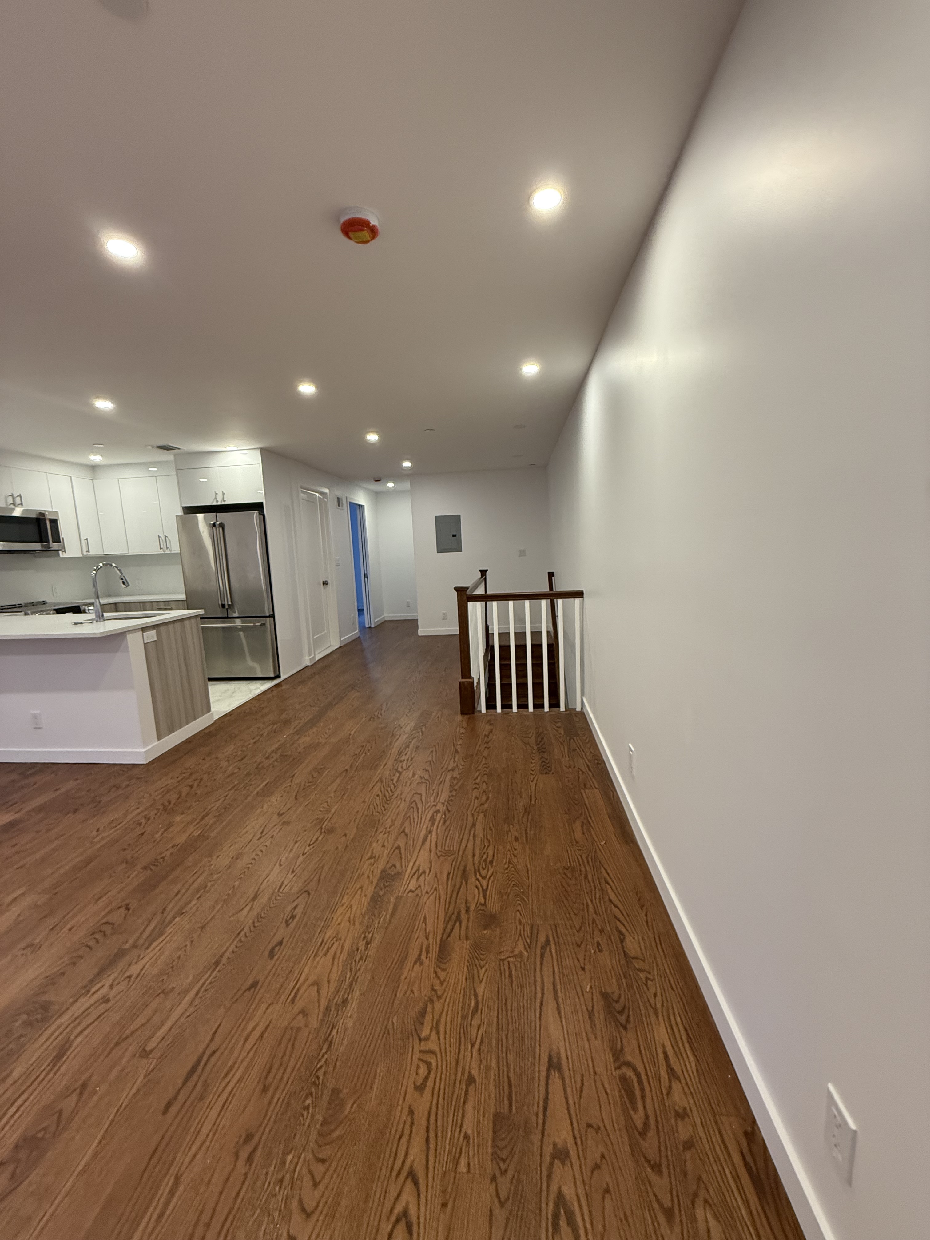 109 President Street, Unit 1 Brooklyn, NY 11231 - Photo 3 of 16 a view of a hallway with wooden floor