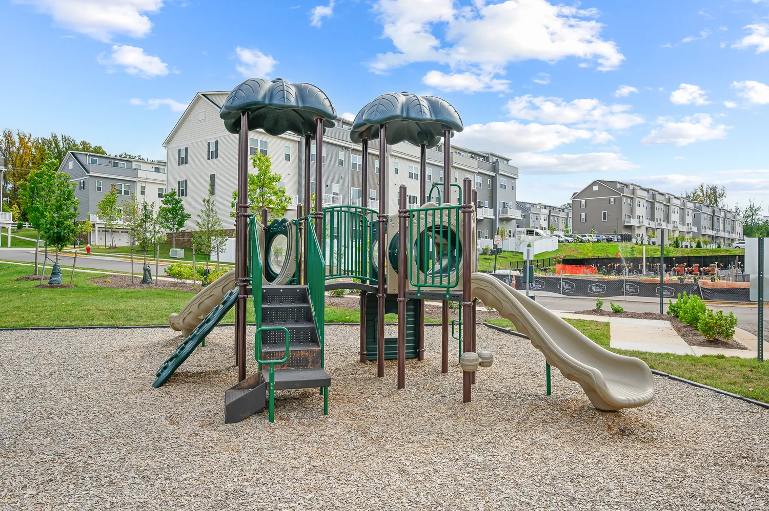 a view of a swimming pool with a patio and a yard