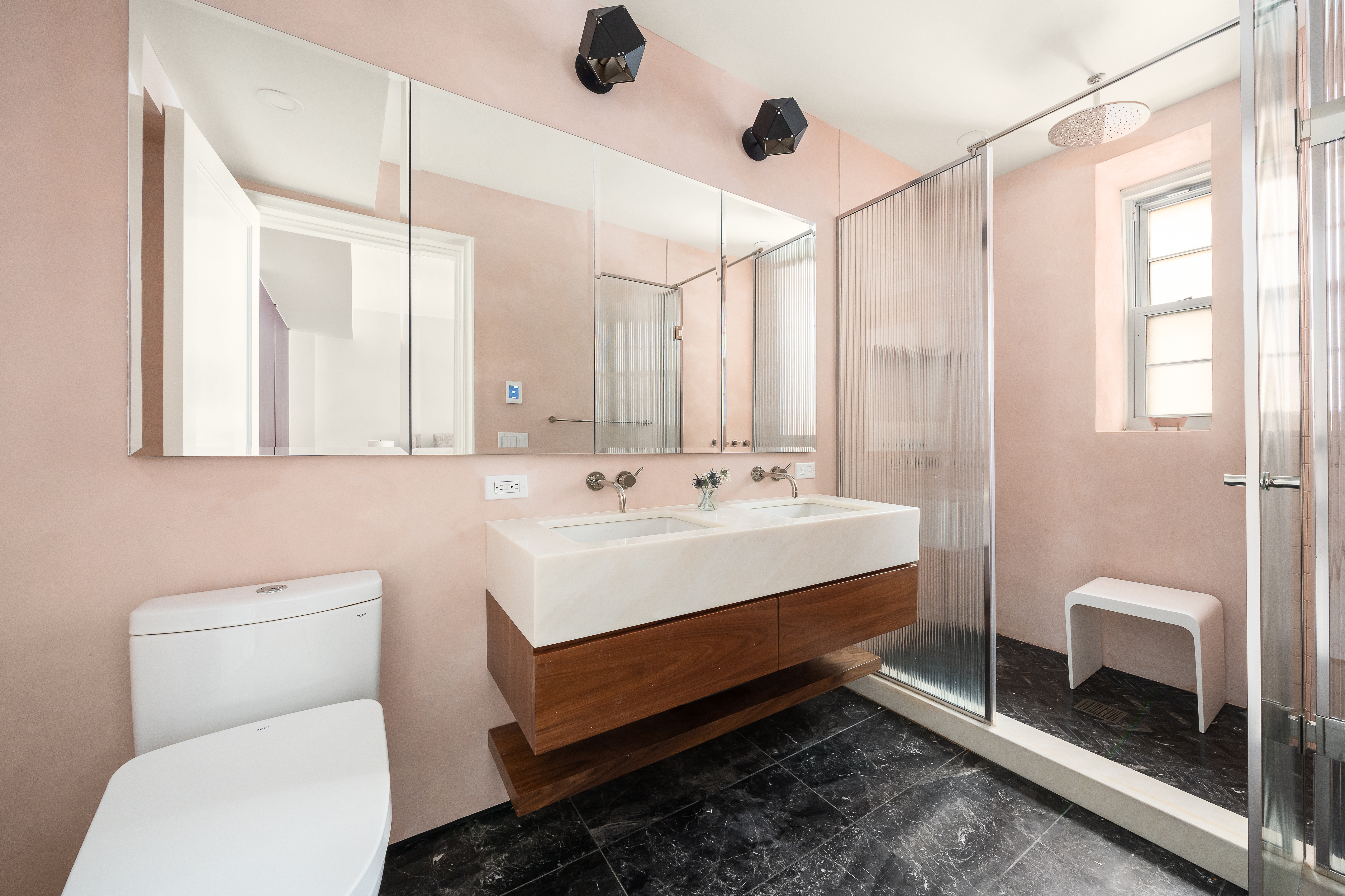 160 Henry Street, Unit 3C Brooklyn, NY 11201 - Photo 9 of 18 a bathroom with a sink a toilet and a mirror