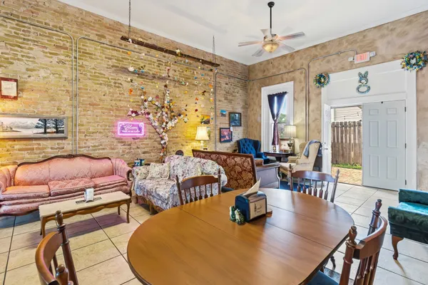 a view of a living room with furniture