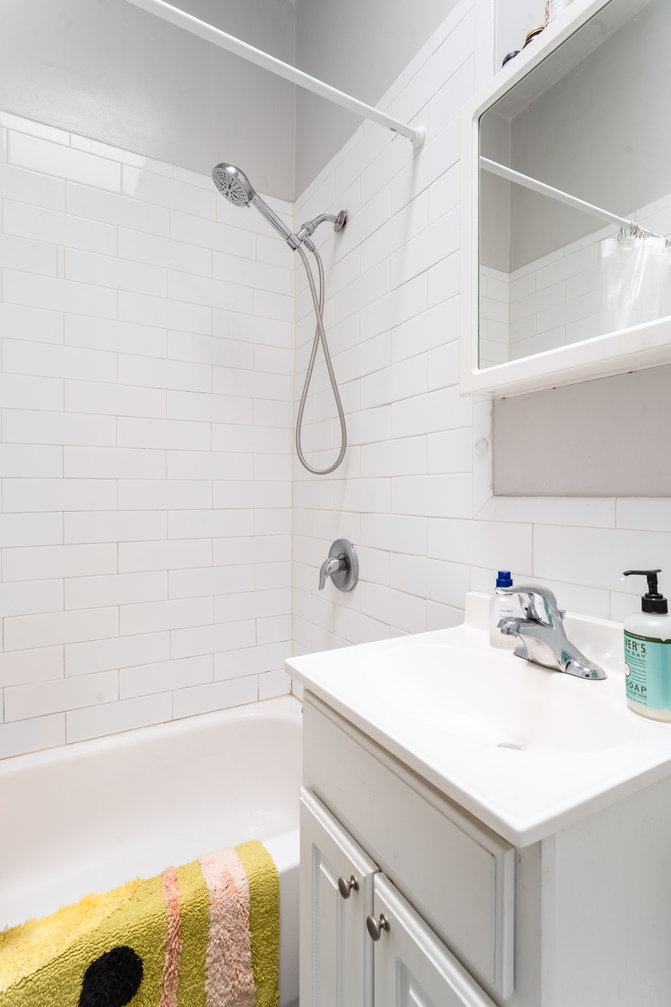 258 Halsey Street, Unit 3 Brooklyn, NY 11216 - Photo 8 of 10 a bathroom with a sink and a bathtub