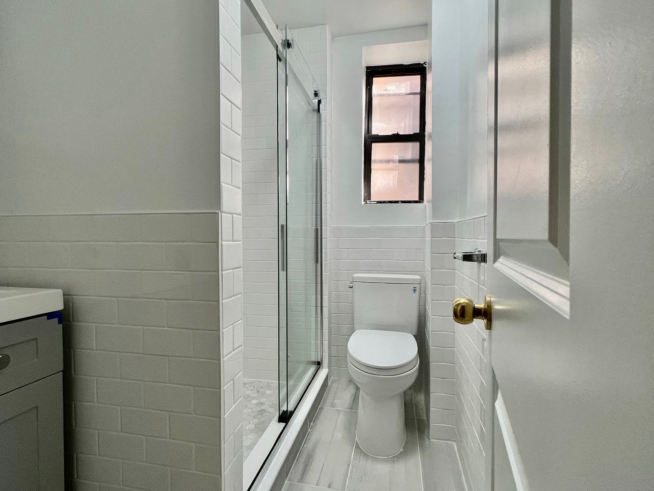 270 East 78th Street, Unit 12 Manhattan, NY 10075 - Photo 5 of 6 a bathroom with a toilet and a shower