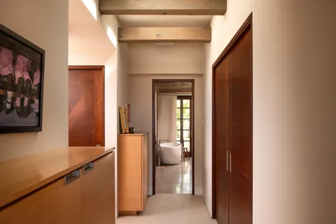 a view of a chairs and table in a terrace