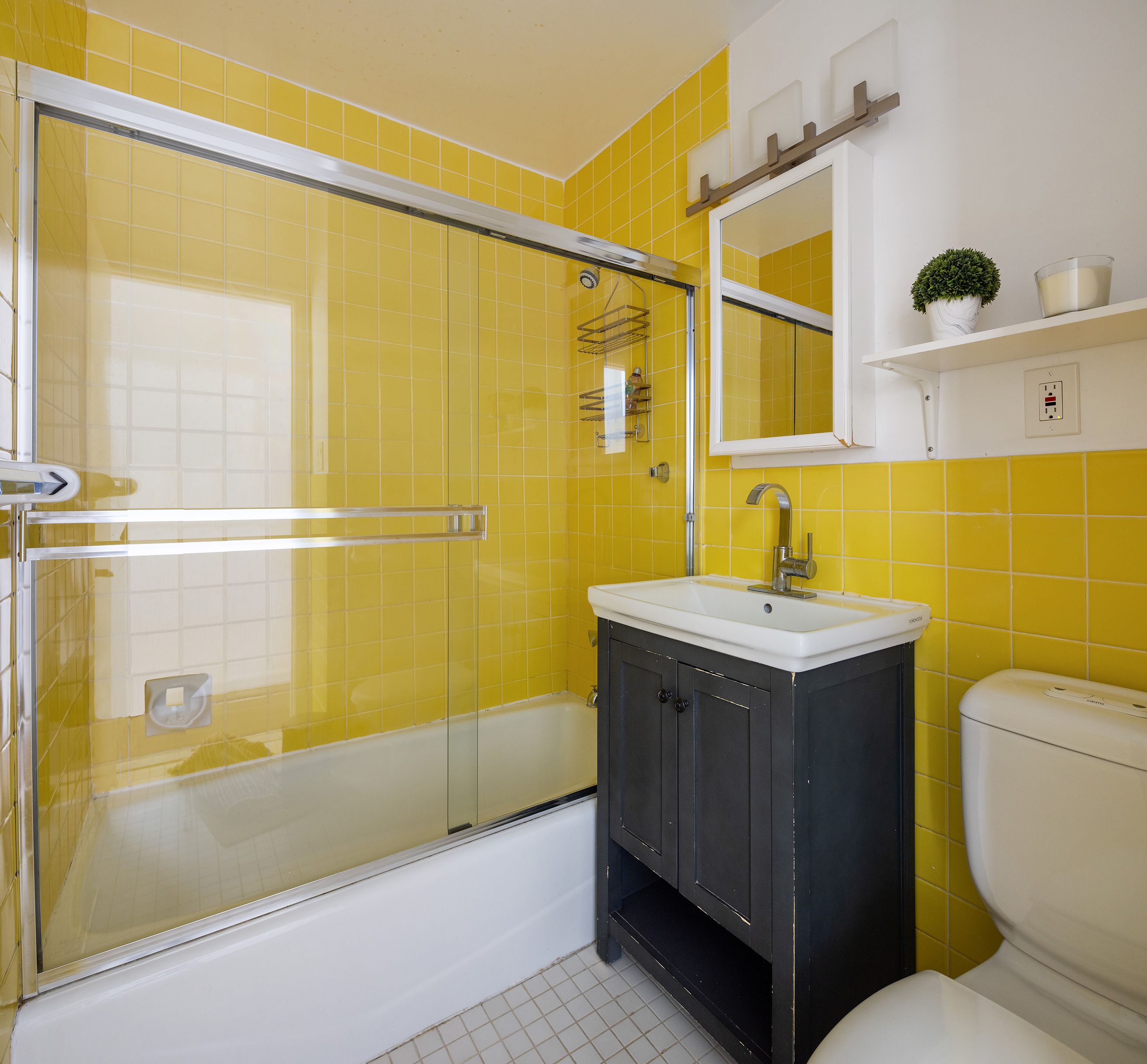 144 West 80th Street Manhattan, NY 10024 - Photo 12 of 22 a bathroom with a sink and a shower