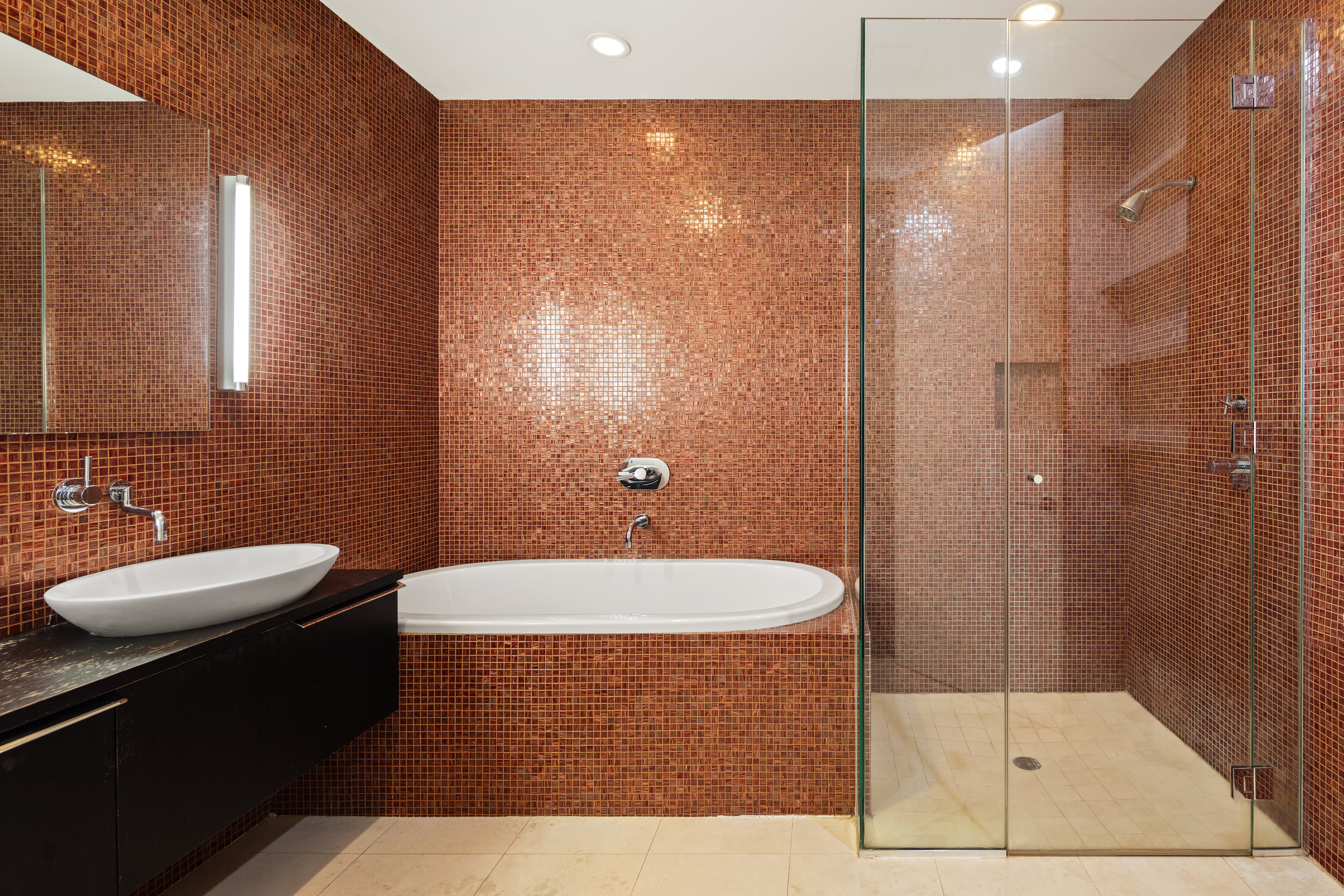 181 Sullivan Street, Unit GARDEN Manhattan, NY 10012 - Photo 6 of 10 a bathroom with a sink a toilet and shower