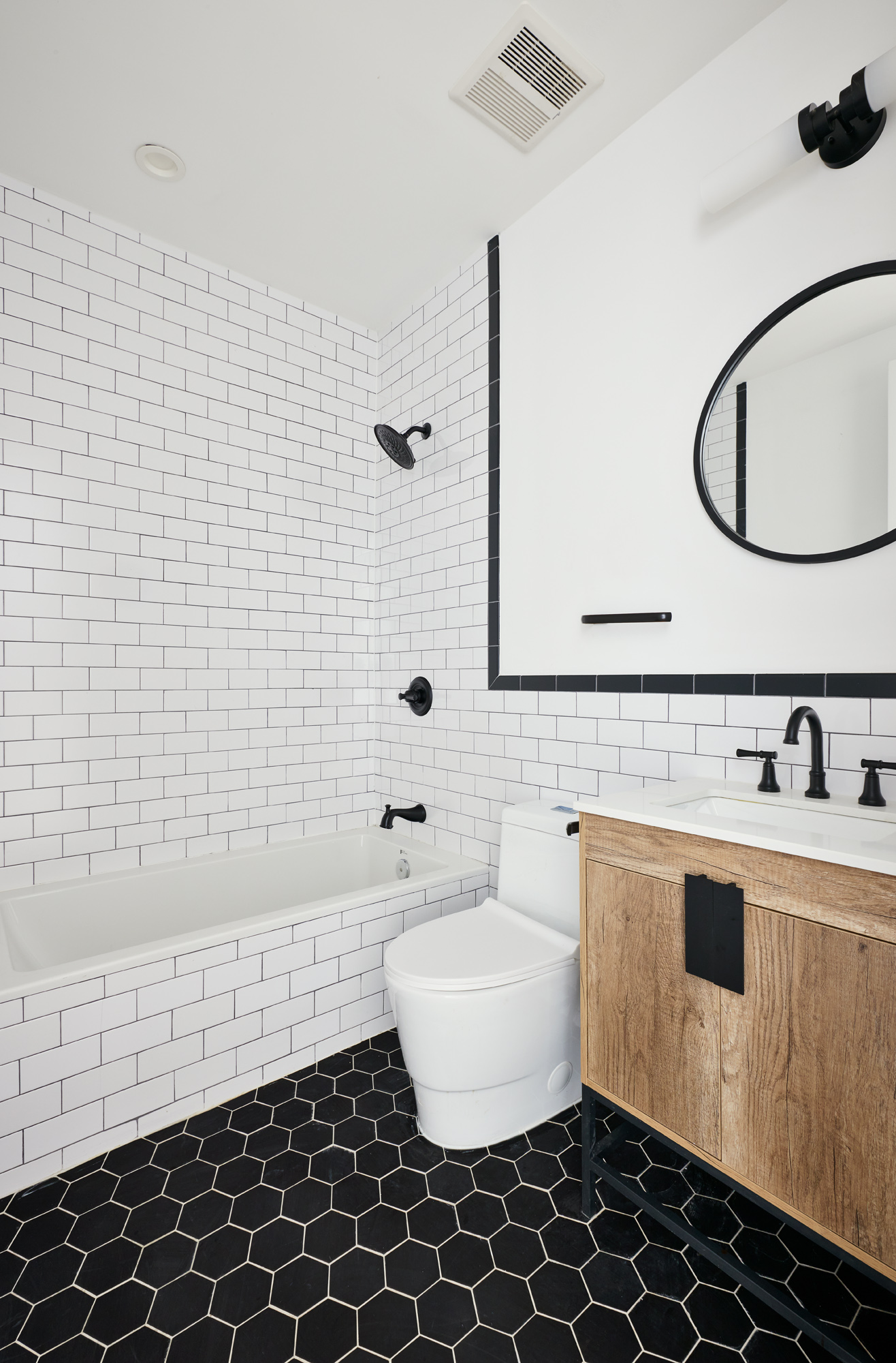 576 Carroll Street, Unit 1 Brooklyn, NY 11215 - Photo 2 of 4 a bathroom with a sink toilet and shower