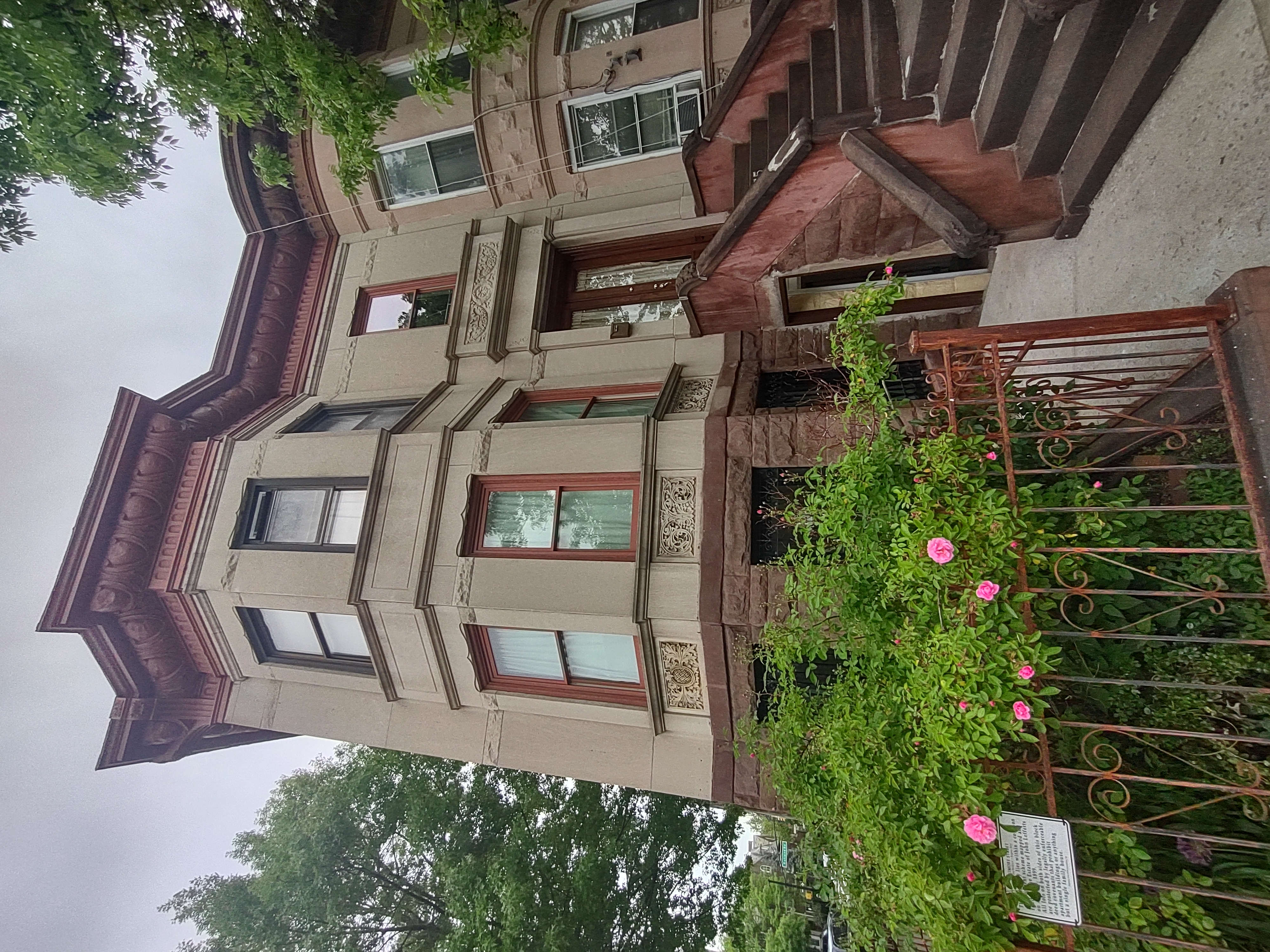175 Fenimore Street Brooklyn, NY 11225 - Photo 6 of 11 a front view of a house with a yard