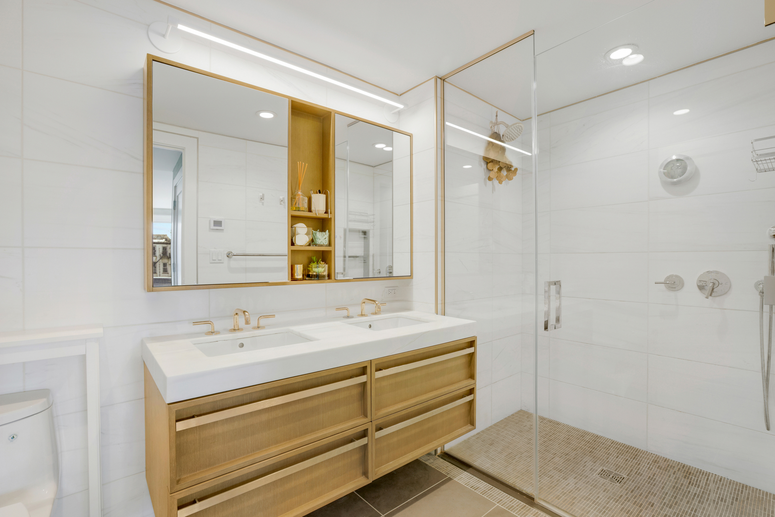 575 4th Avenue, Unit 3F Brooklyn, NY 11215 - Photo 7 of 20 a bathroom with a double vanity sink mirror and shower