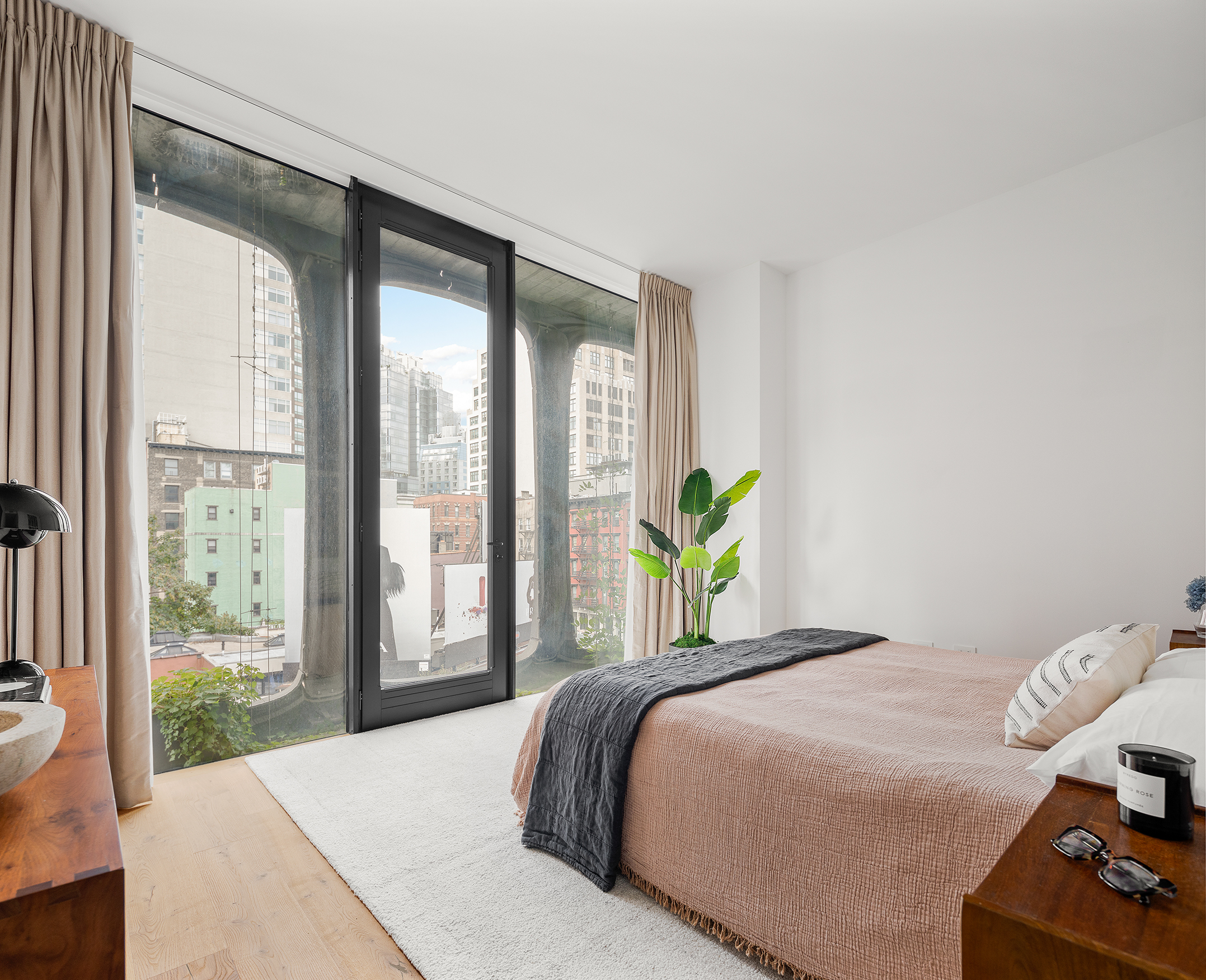 325 West Broadway, Unit 4B Manhattan, NY 10013 - Photo 7 of 17 a bedroom with a bed and window