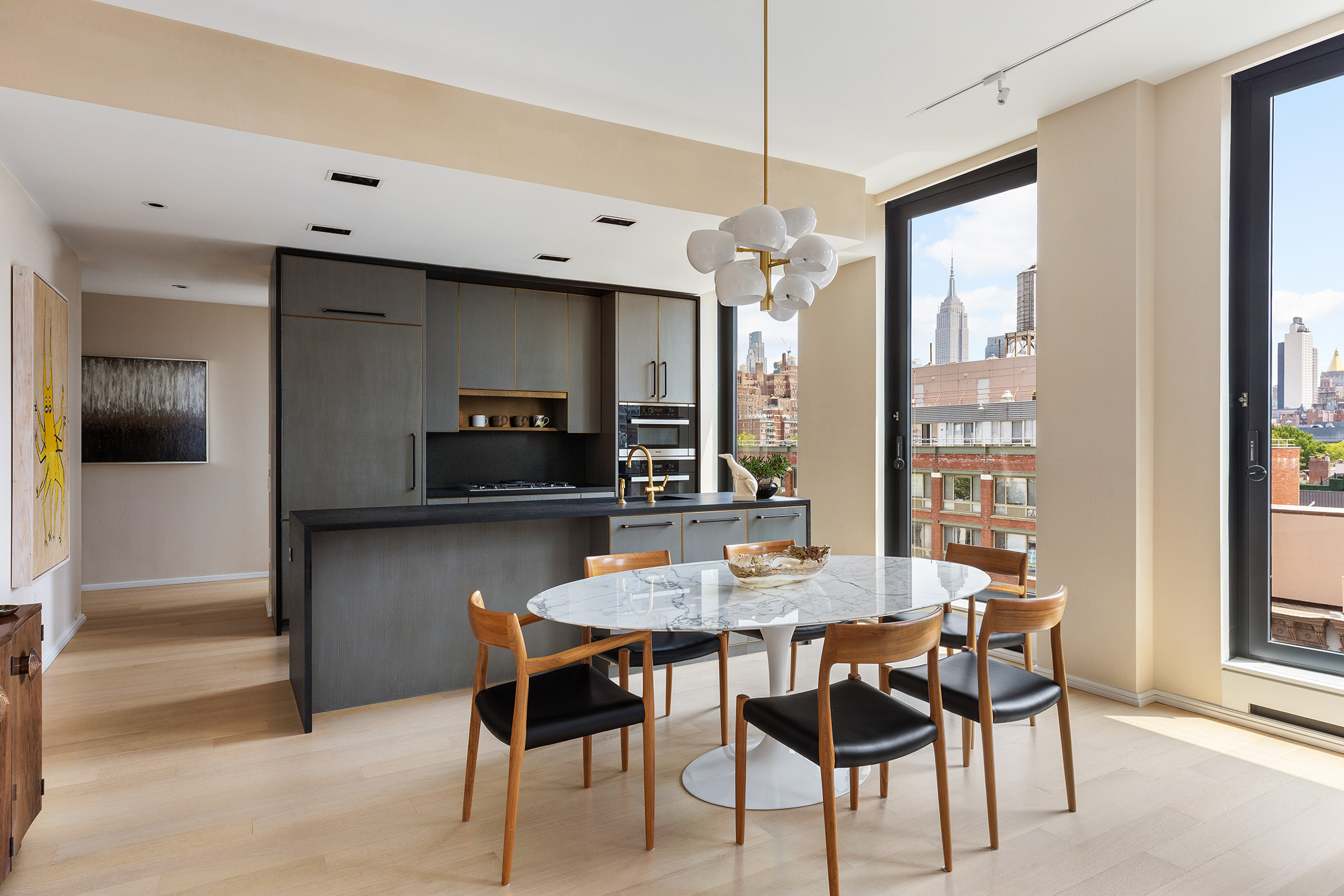 505 West 19th Street, Unit 7B Manhattan, NY 10011 - Photo 5 of 16 a view of a dining room with furniture and window
