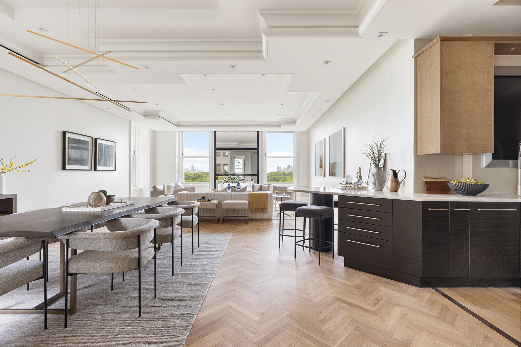 1 Central Park South, Unit 8010203 Manhattan, NY 10019 - Photo 5 of 45 a living room with lots of furniture and view kitchen