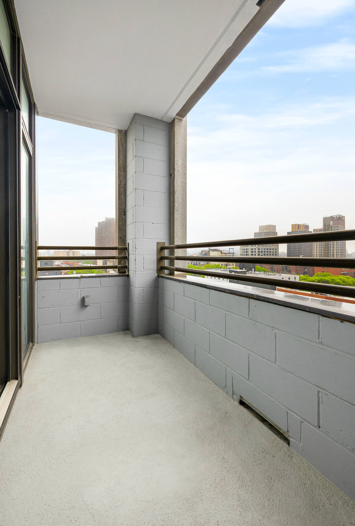 424 Bedford Avenue, Unit 6B Brooklyn, NY 11249 - Photo 6 of 11 a kitchen with stainless steel appliances a stove and a refrigerator