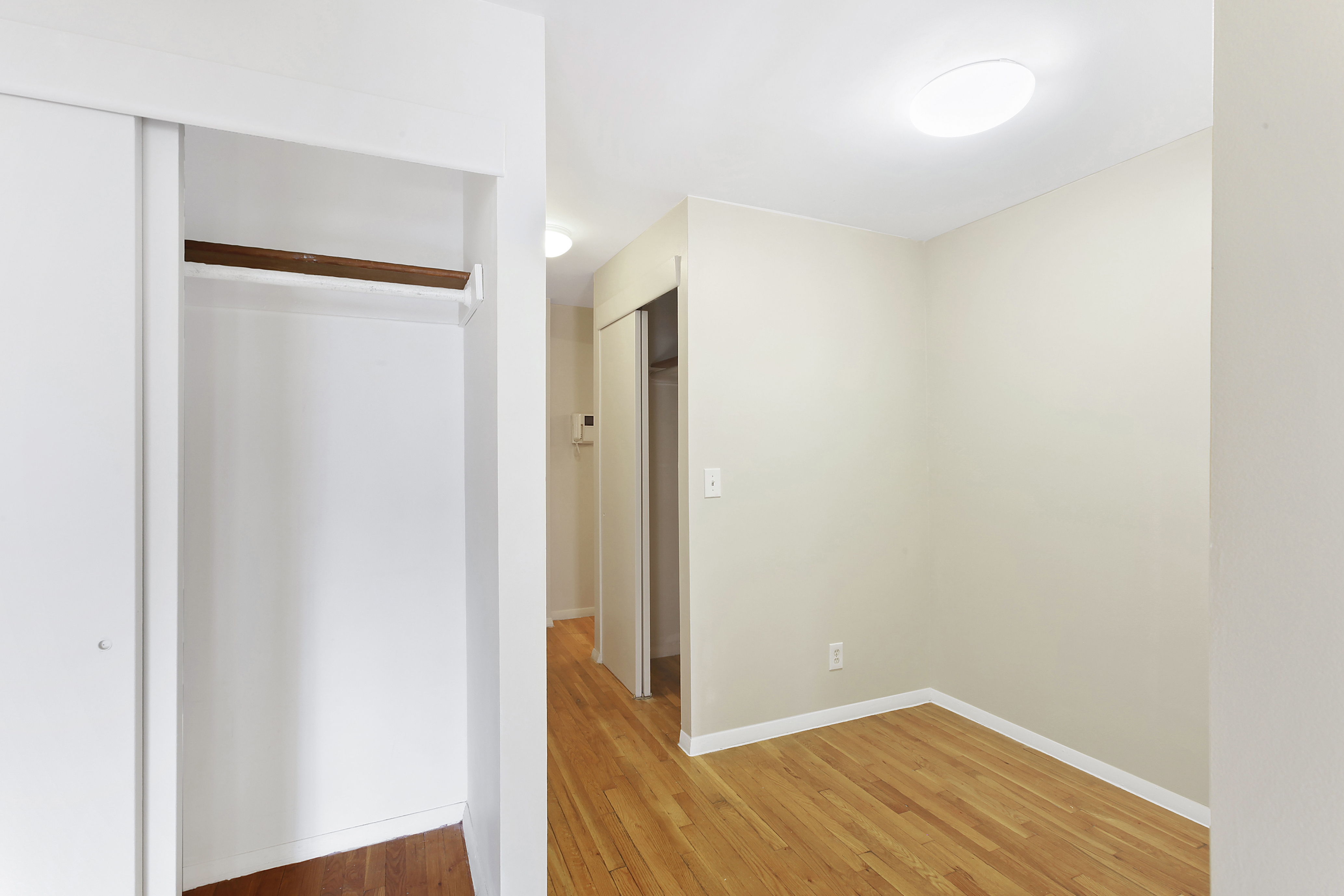 325 West 51st Street, Unit 4C Manhattan, NY 10019 - Photo 3 of 7 a view of a room with wooden floor