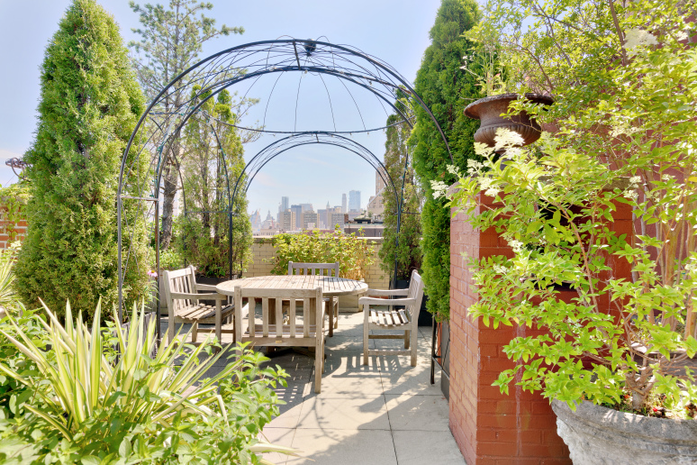 41 5th Avenue, Unit 2F Manhattan, NY 10003 - Photo 10 of 12 a view of swimming pool with outdoor seating and plants
