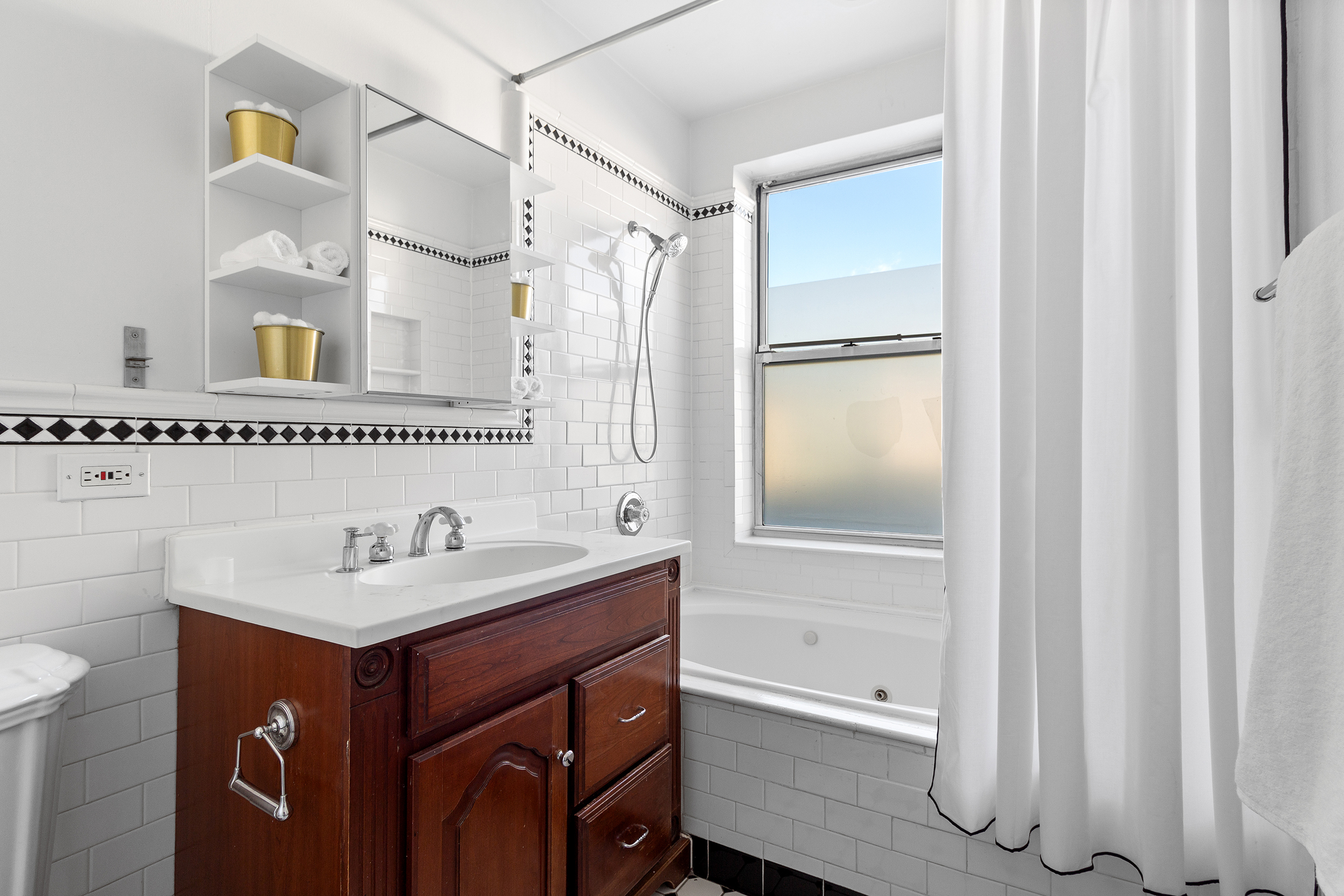 579 5th Street Brooklyn, NY 11215 - Photo 10 of 19 a bathroom with a sink and a mirror