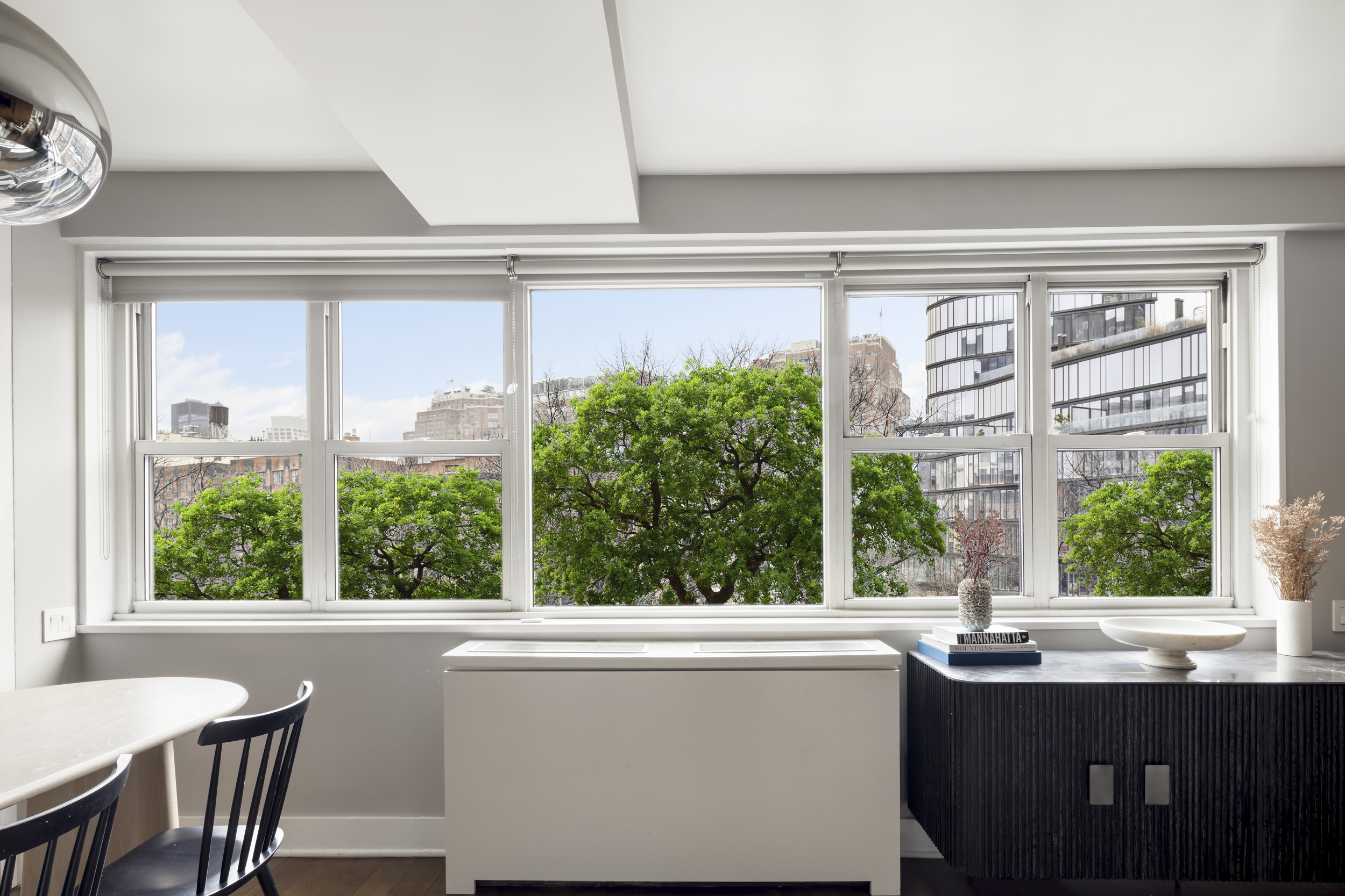 2 Horatio Street, Unit 4JS Manhattan, NY 10014 - Photo 4 of 20 a bathroom with a sink and a large mirror