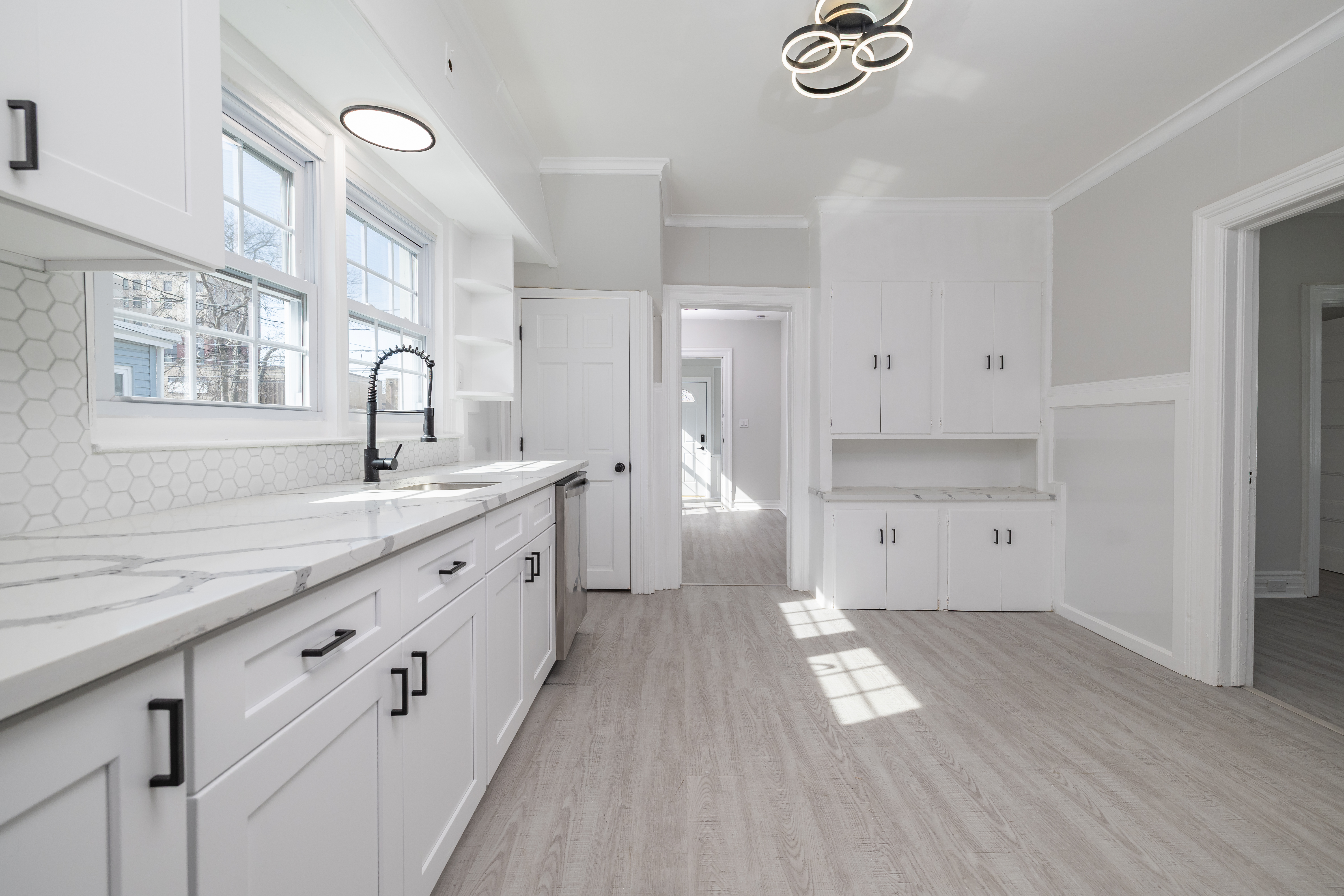 13-03 Brunswick Avenue Queens, NY 11691 - Photo 7 of 27 a spacious bathroom with a double vanity sink and a mirror