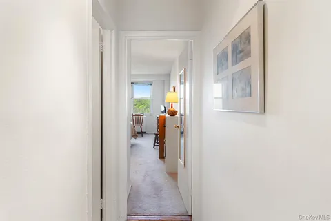 a bedroom with a bed and a desk