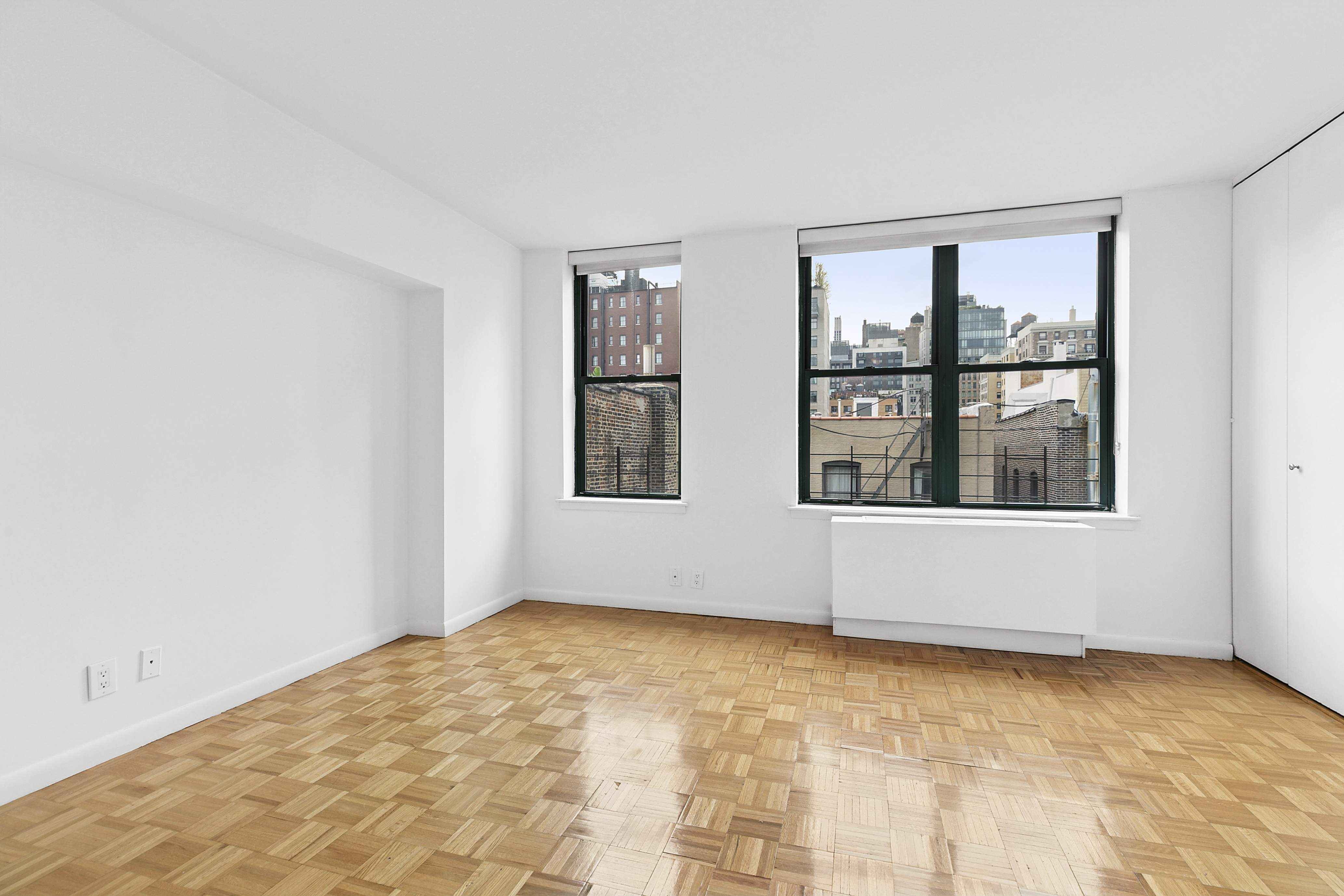 2250 Broadway, Unit 6K Manhattan, NY 10024 - Photo 6 of 15 a view of an empty room with a window