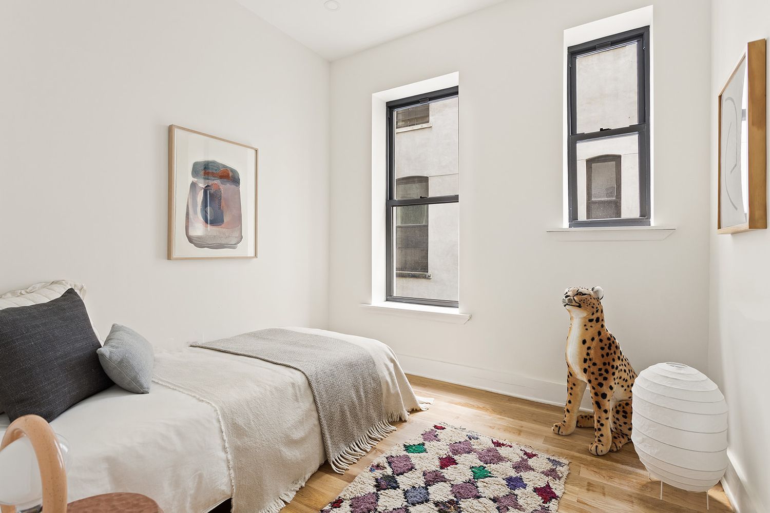 917 Saint Marks Avenue, Unit 3 Brooklyn, NY 11213 - Photo 10 of 12 a bedroom with a bed and a window