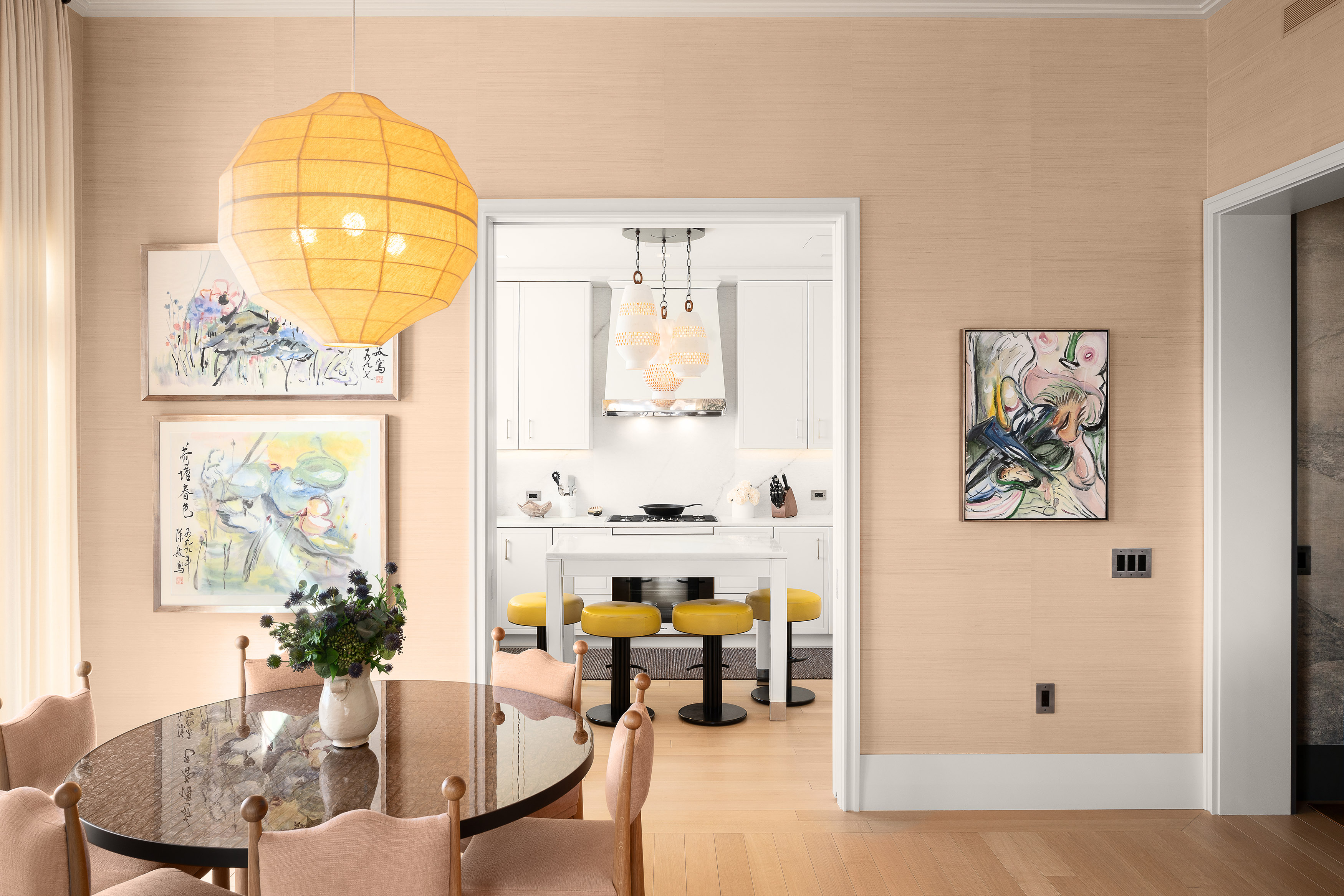 200 East 83rd Street, Unit 24C Manhattan, NY 10028 - Photo 10 of 35 a living room with furniture and a chandelier