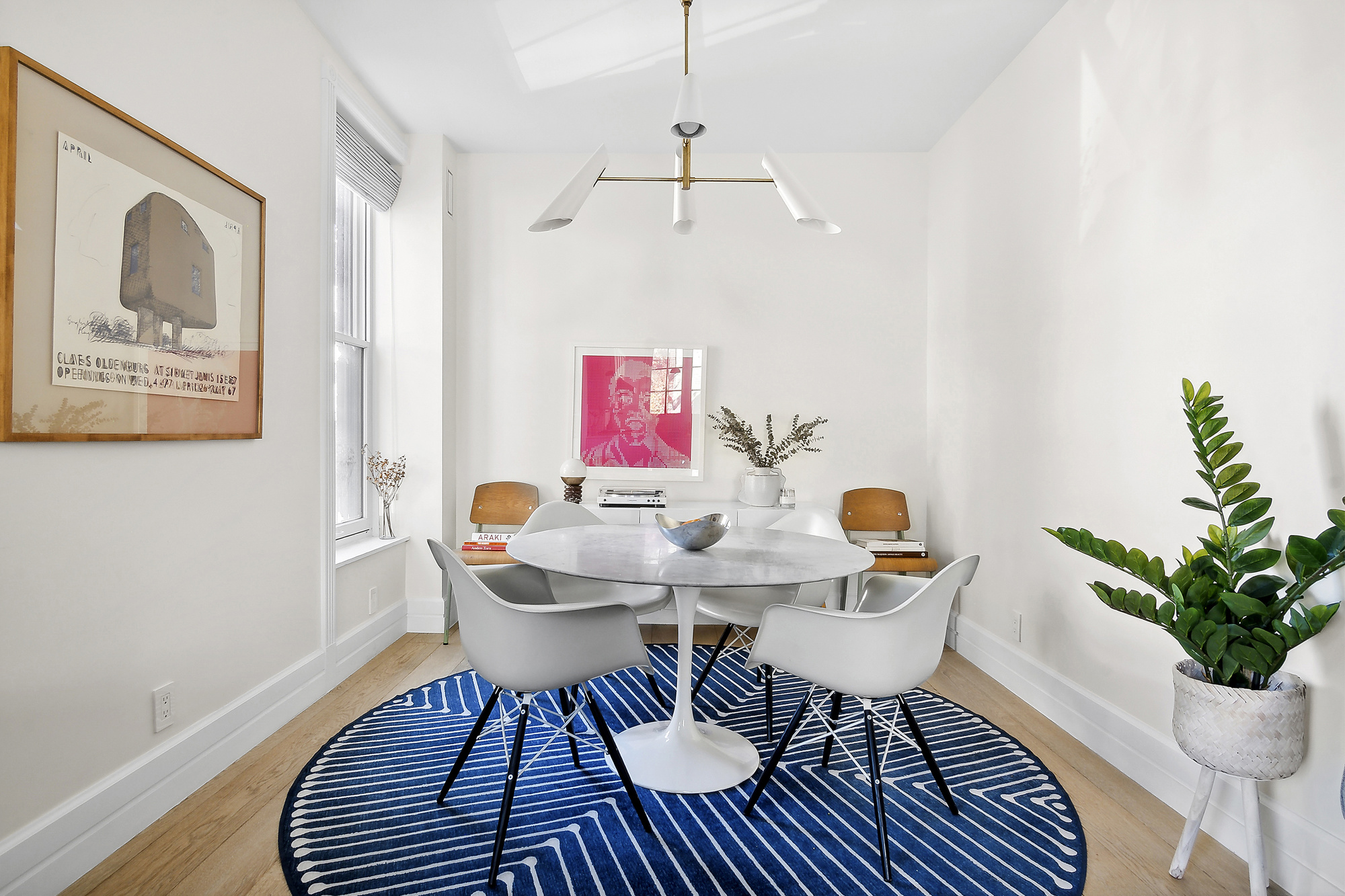 374 14th Street Brooklyn, NY 11215 - Photo 5 of 11 a dining room with furniture potted plants and wooden floor