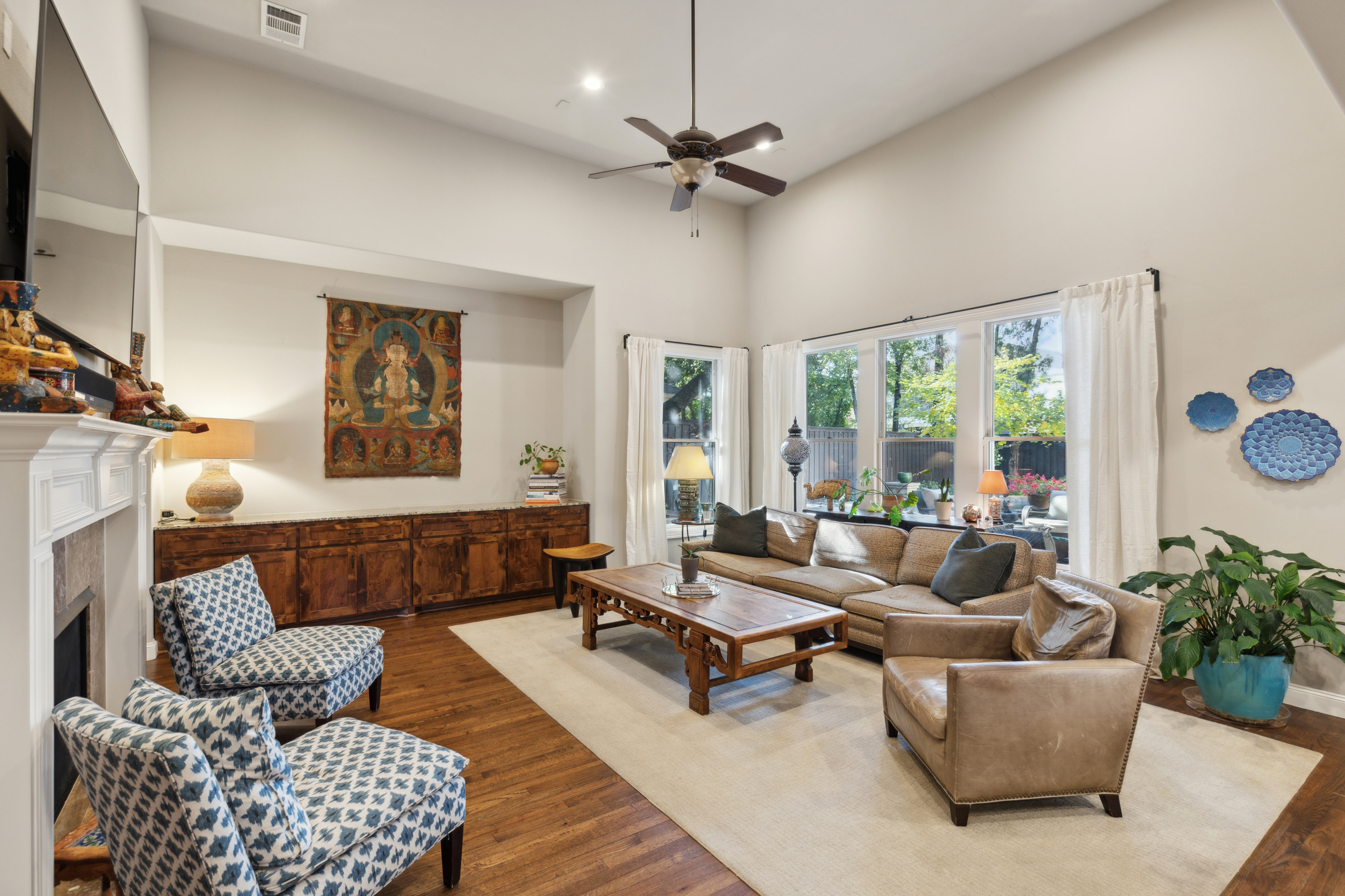 8411 Midway Road Dallas, TX 75209 - Photo 8 of 29 a living room with furniture and a large window