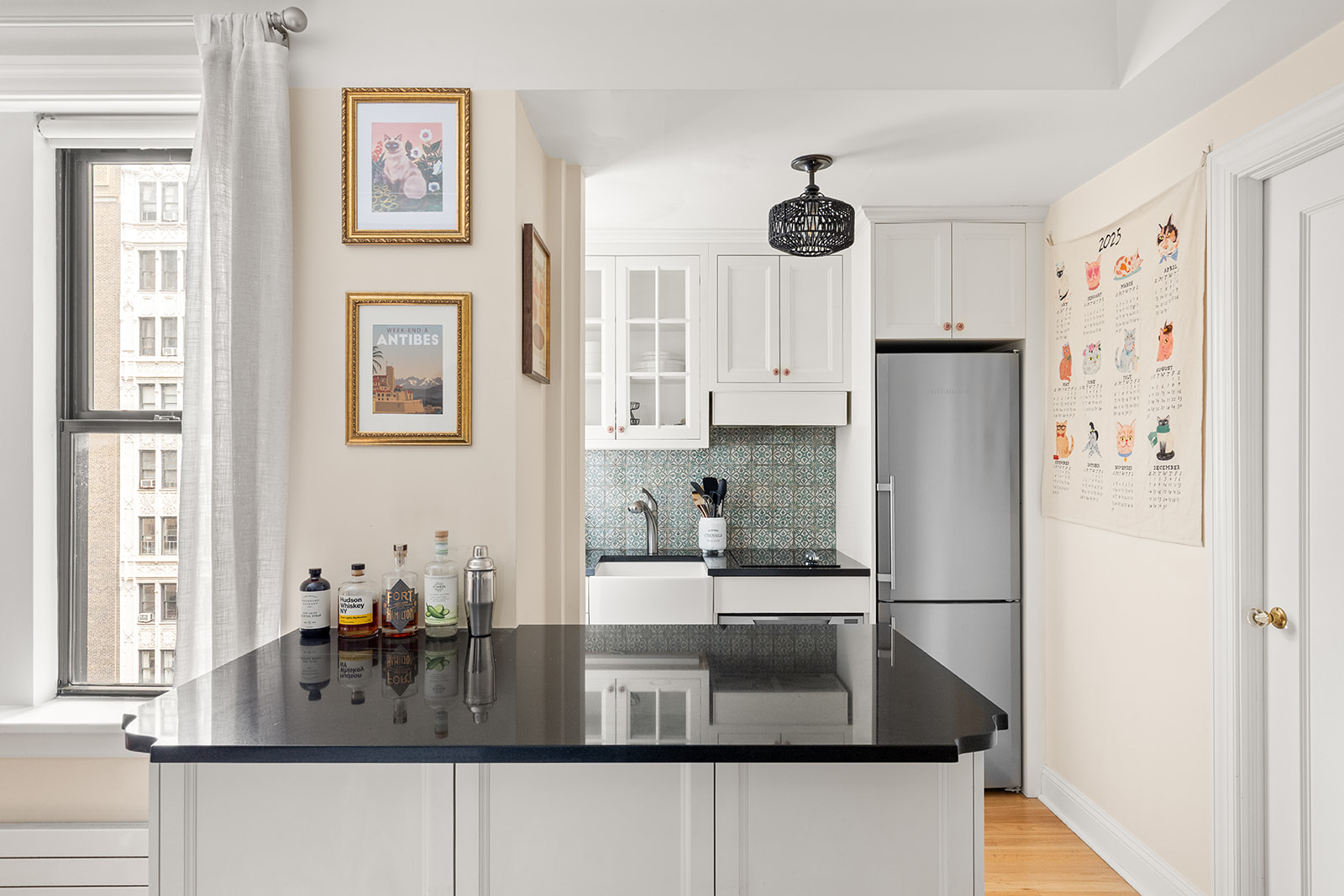 41 West 72nd Street, Unit 10B Manhattan, NY 10023 - Photo 3 of 7 a kitchen with stainless steel appliances granite countertop a refrigerator and a sink