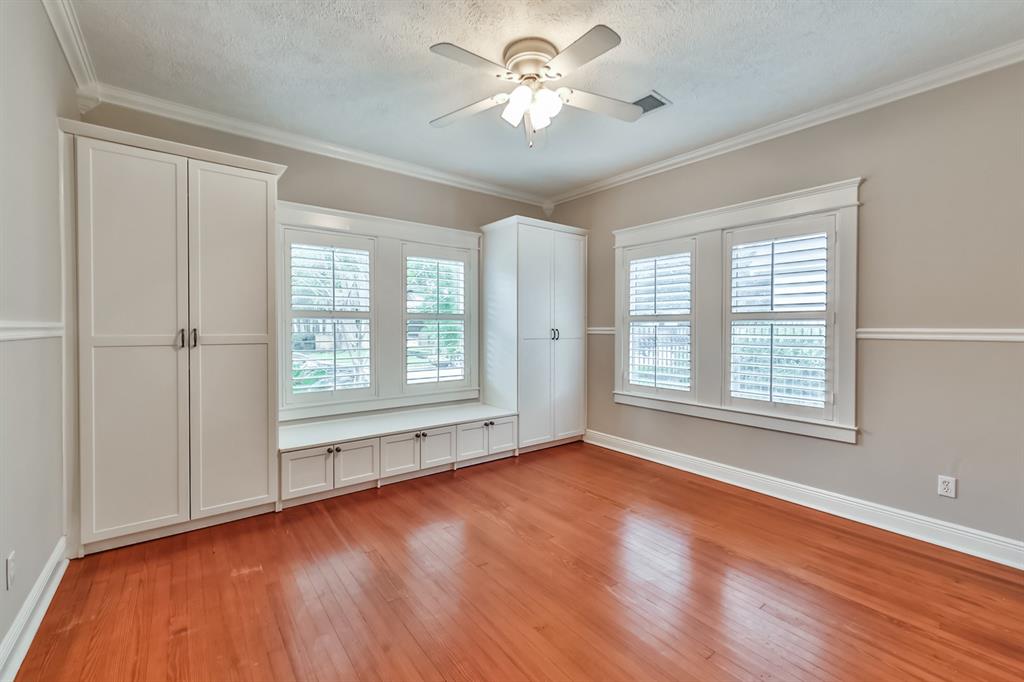 1120 Winston Street Houston, TX 77009 - Photo 26 of 29 a view of empty room with wooden floor and fan