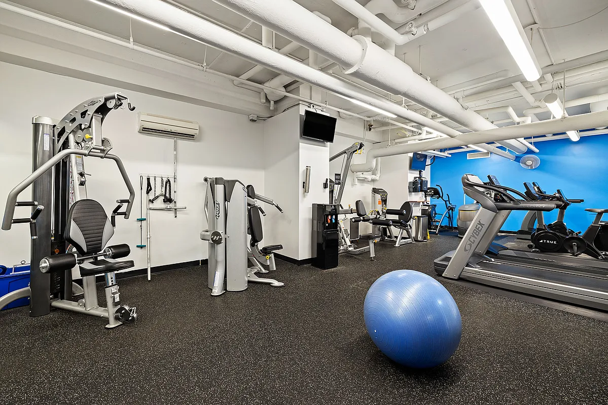 185 West End Avenue, Unit 17B Manhattan, NY 10023 - Photo 3 of 9 a view of a room with gym equipment
