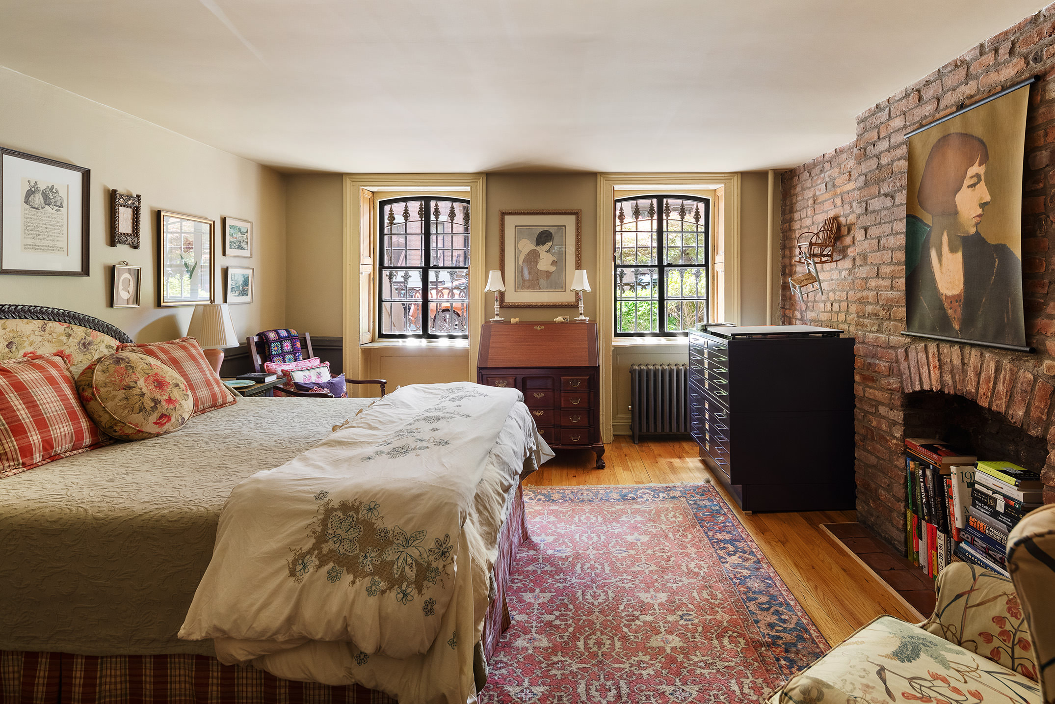 433 Pacific Street Brooklyn, NY 11217 - Photo 15 of 22 a bed room with a bed and a chair