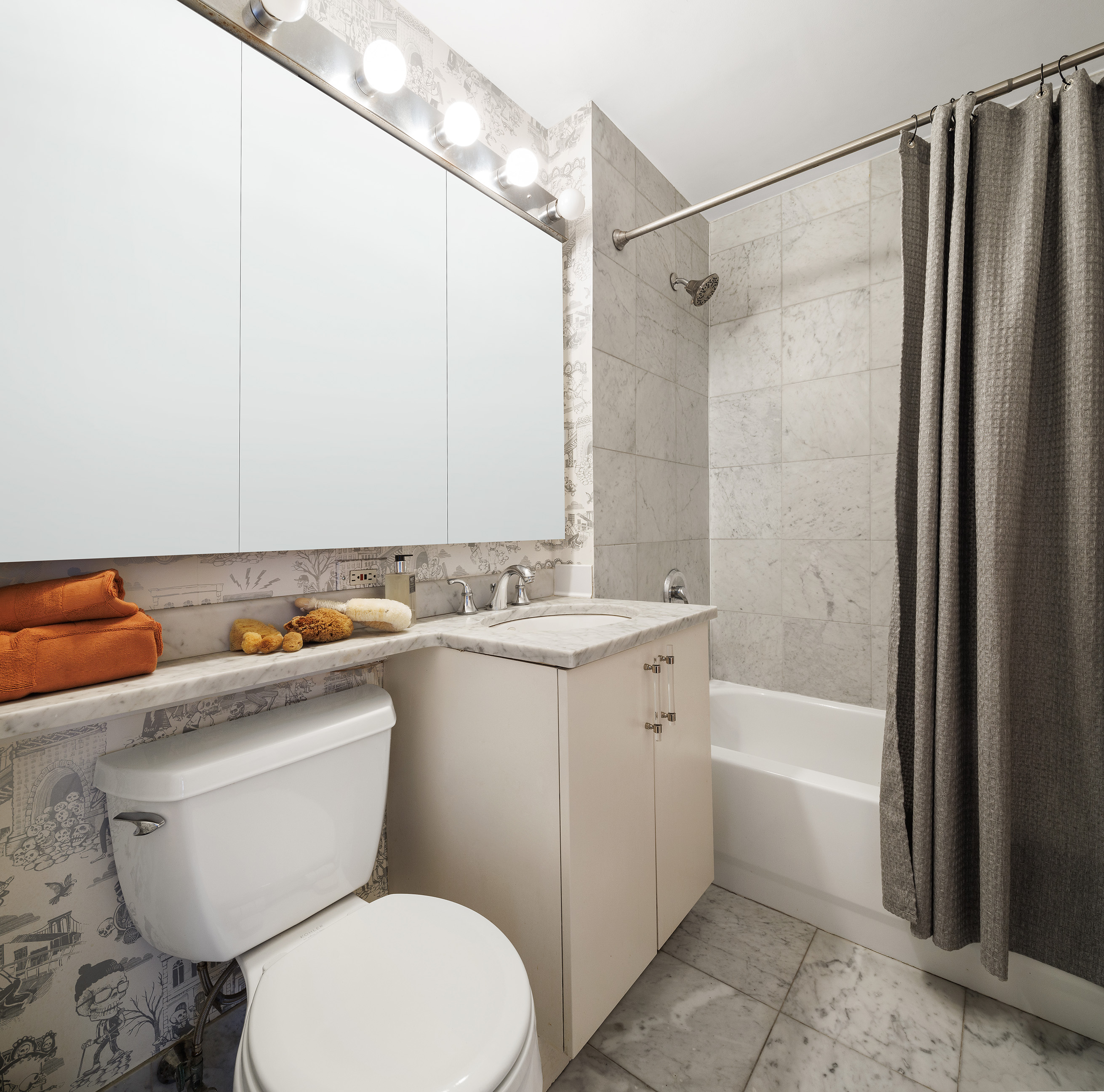 199 Bowery, Unit 3D Manhattan, NY 10002 - Photo 11 of 12 a bathroom with a sink a toilet and shower