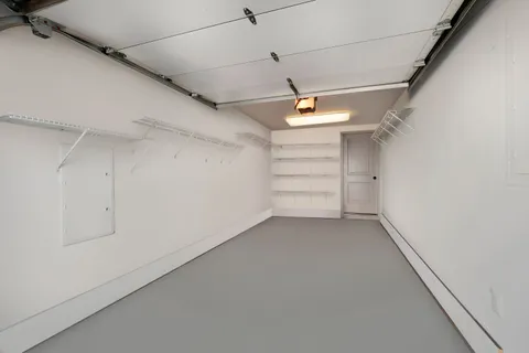 a view of a room with racks on the wall