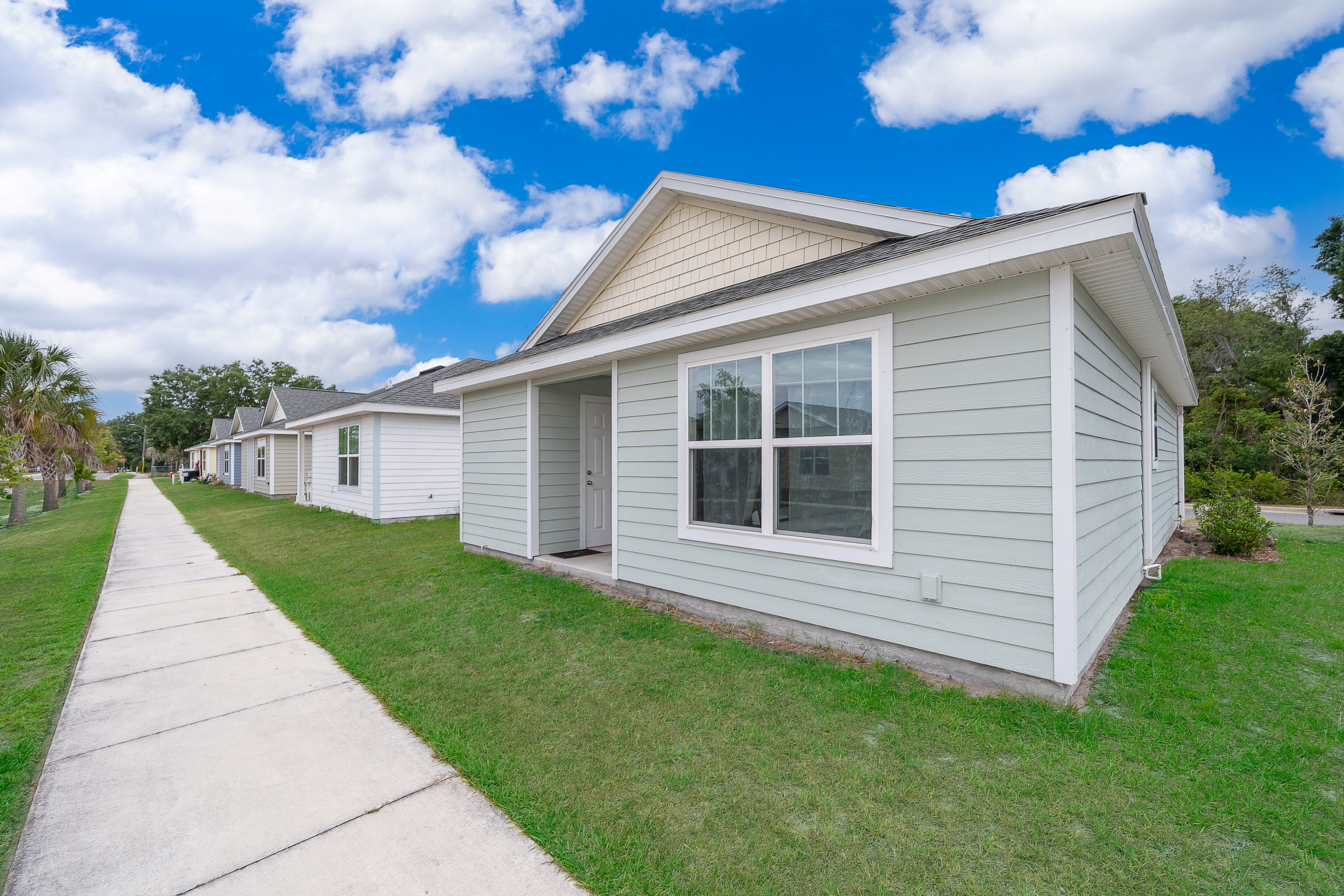 1360 Cottage Circle Tavares, FL 32778 - Photo 18 of 25 a view of a house with a yard