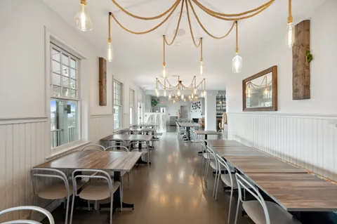 a view of livingroom with furniture and window