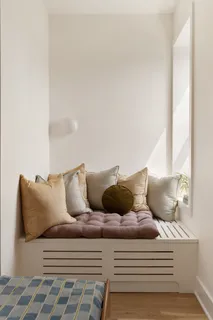 a living room with furniture and a couch