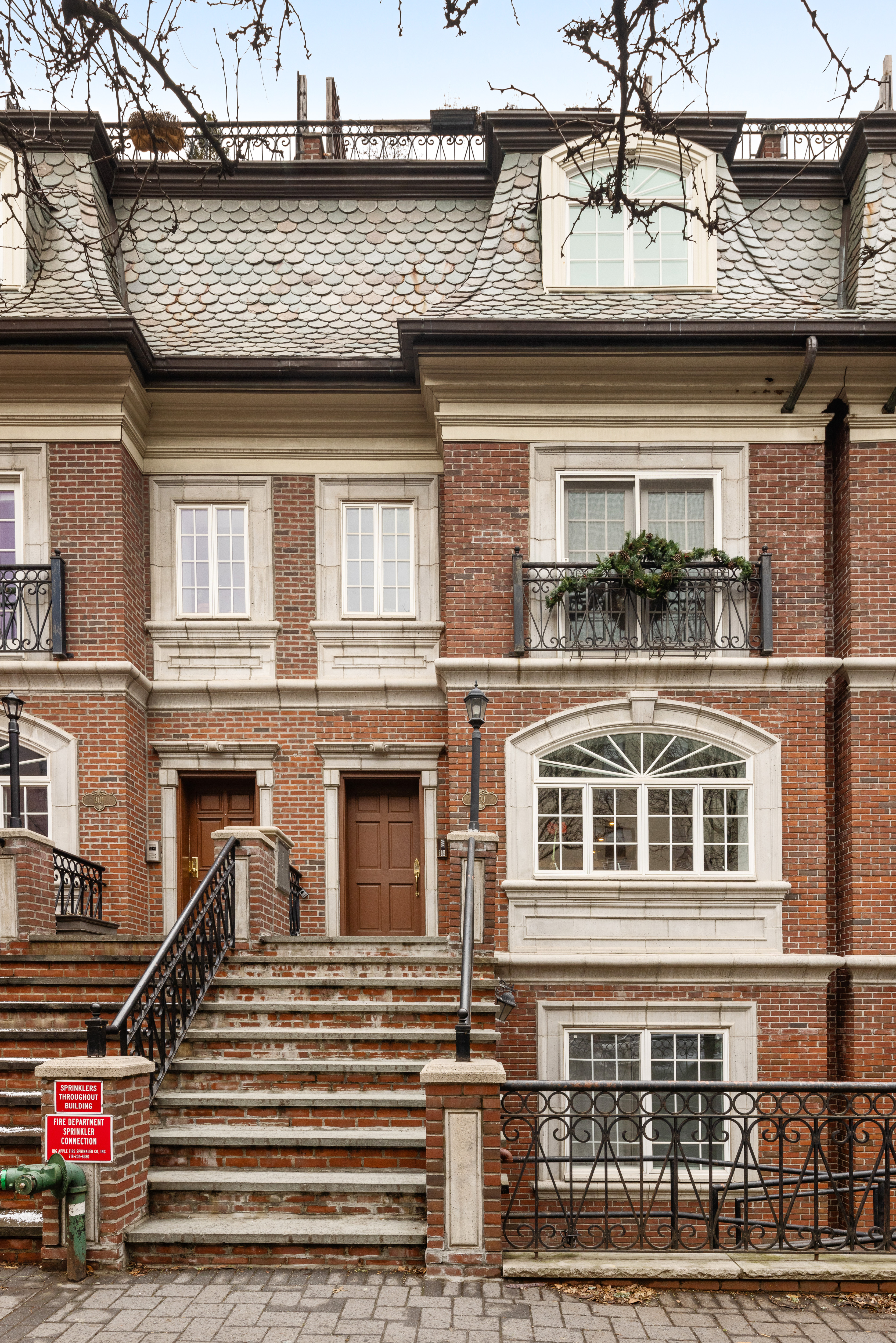 303 Warren Street, Unit 2 Brooklyn, NY 11201 - Photo 9 of 10 a front view of a house with a outdoor space