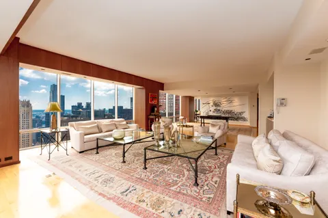 a view of cars parked in front of a building