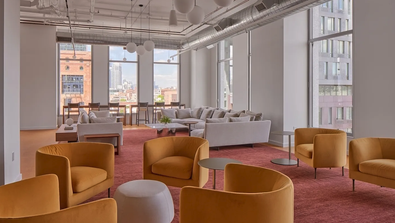 5 South 5th Street, Unit 913 Brooklyn, NY 11249 - Photo 20 of 24 a living room with furniture and a large window