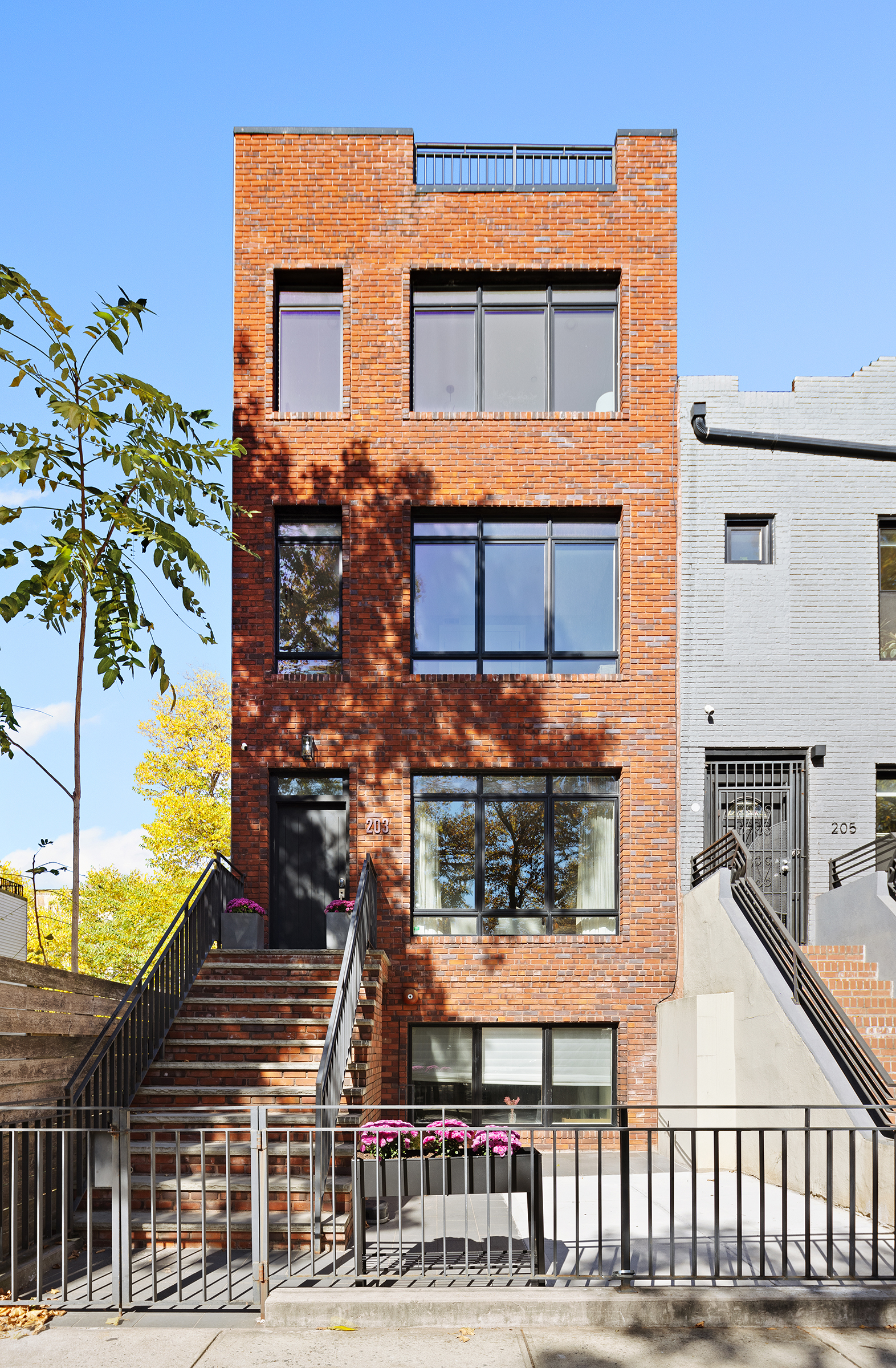 203 Halsey Street Brooklyn, NY 11216 - Photo 19 of 21 a view of a building with a door