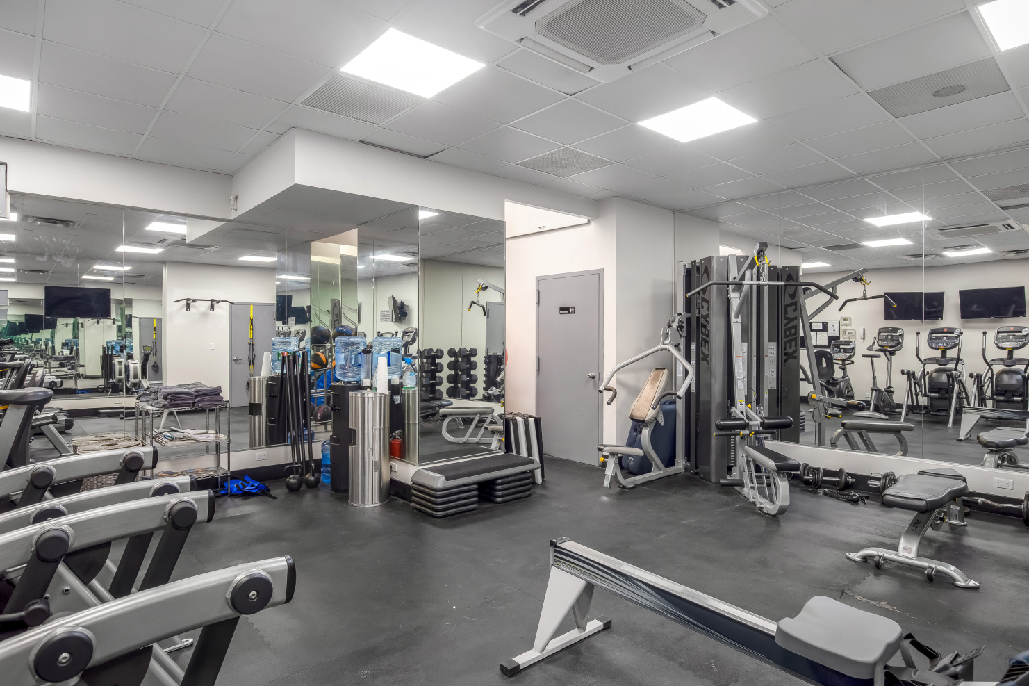 150 East 61st Street, Unit 8B Manhattan, NY 10065 - Photo 28 of 30 a view of a room with gym equipment