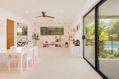 a view of a living room and dining room