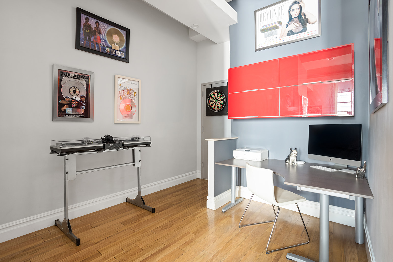 3 Hanover Square, Unit 7D Manhattan, NY 10004 - Photo 6 of 8 a view of a workspace with furniture and wooden floor