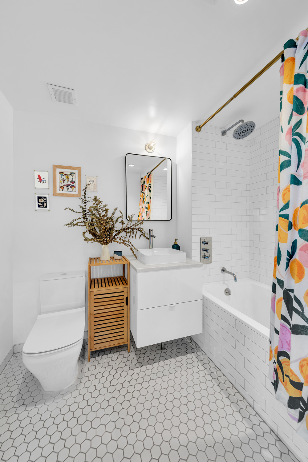 651 New York Avenue, Unit 604 Brooklyn, NY 11203 - Photo 9 of 13 a bathroom with a sink a toilet and bathtub