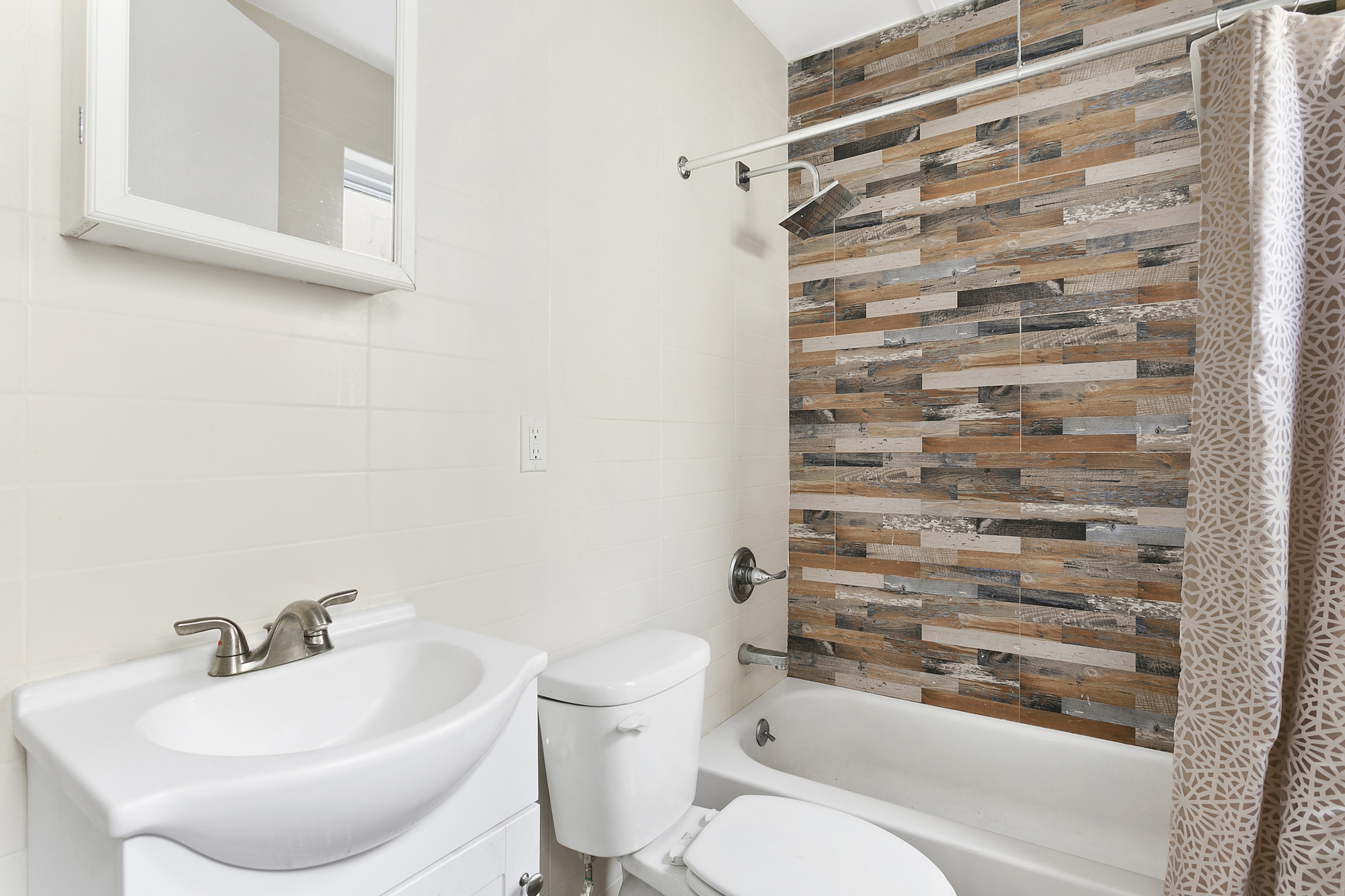342 East 9th Street Brooklyn, NY 11218 - Photo 11 of 12 a bathroom with a toilet and a sink
